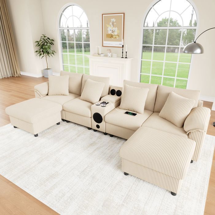 Modulares Ecksofa aus grauem Cord mit Bluetooth-Lautsprecher und Konsole, 6-Sitzer-Sofa mit USB-Anschluss und Kissen, Beige