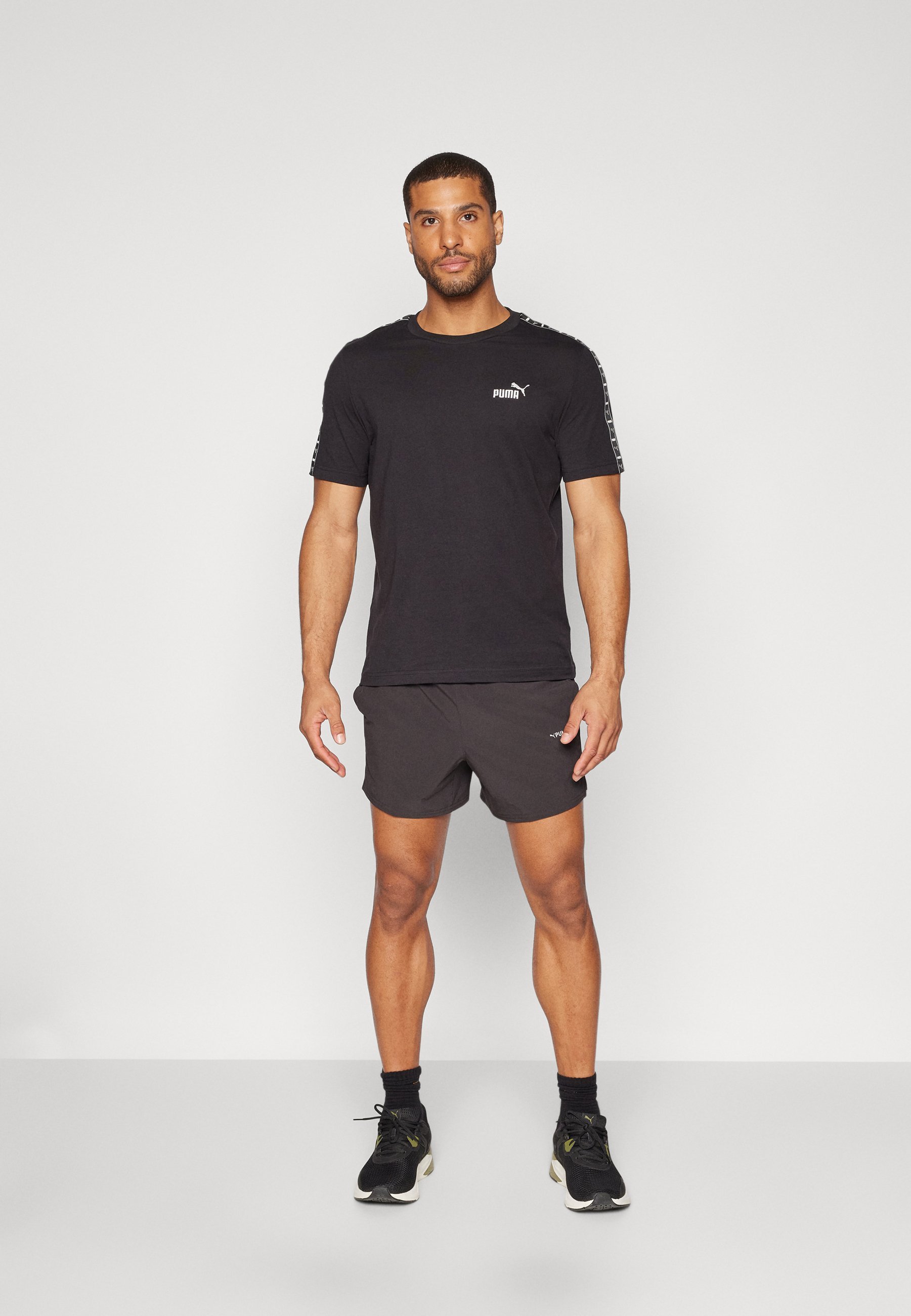 Puma TAPE TEE - T-shirt stampata - nera