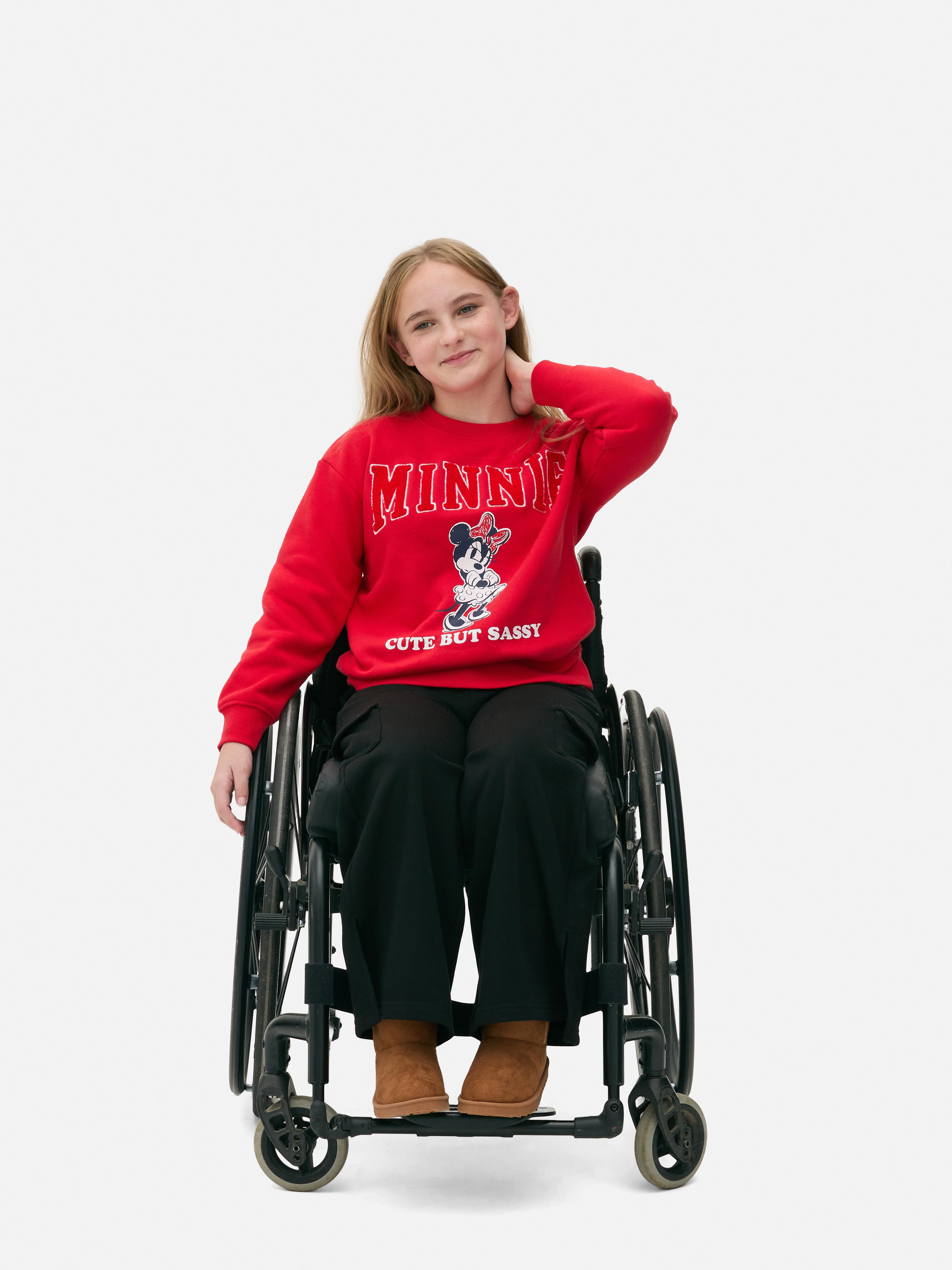 Hanorac Disney cu imprimeu Minnie Mouse Hanorac Disney cu guler rotund, umeri căzuți și manșete cu nervuri