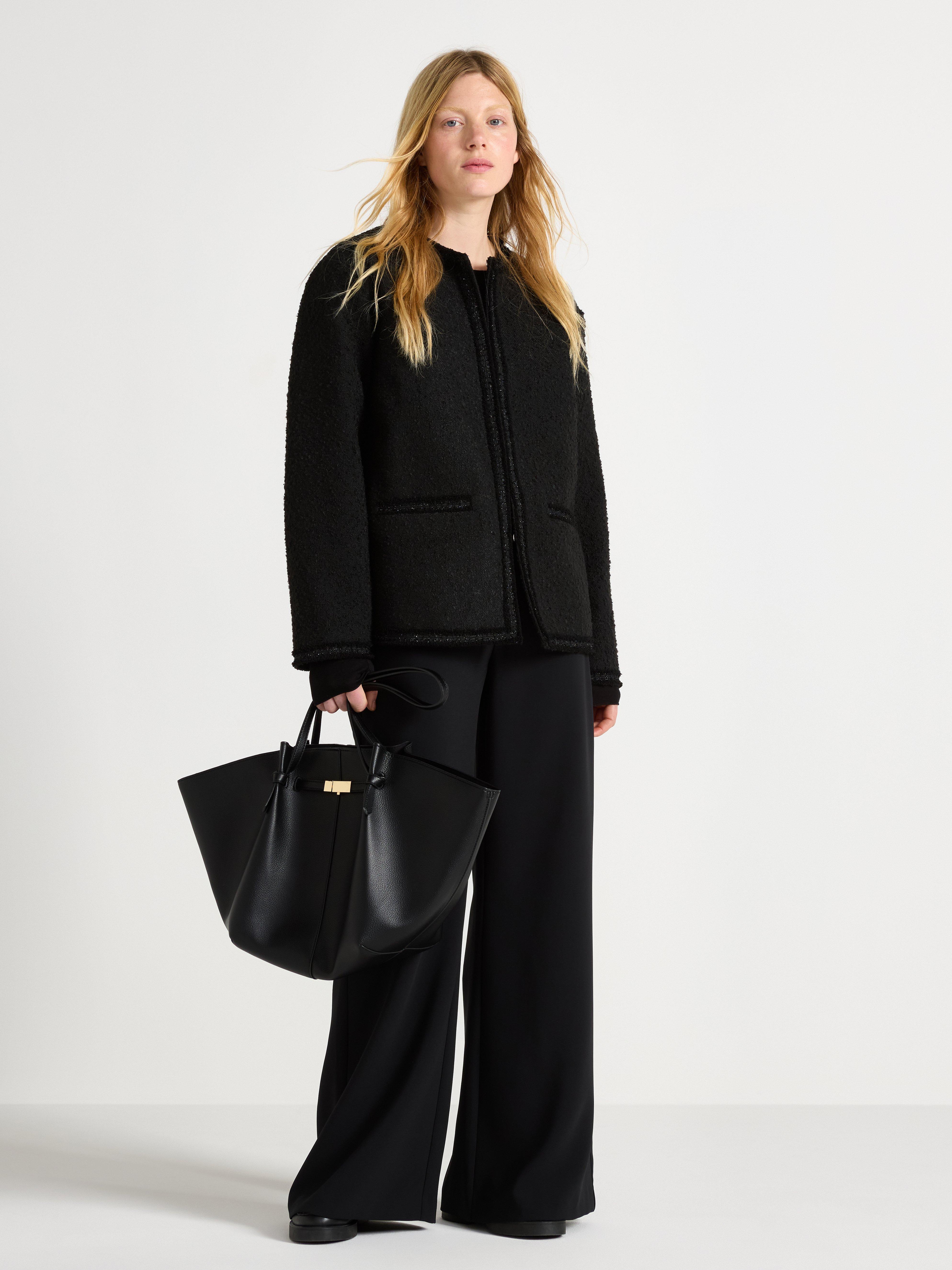 Jaqueta com detalhes em lurex preto
