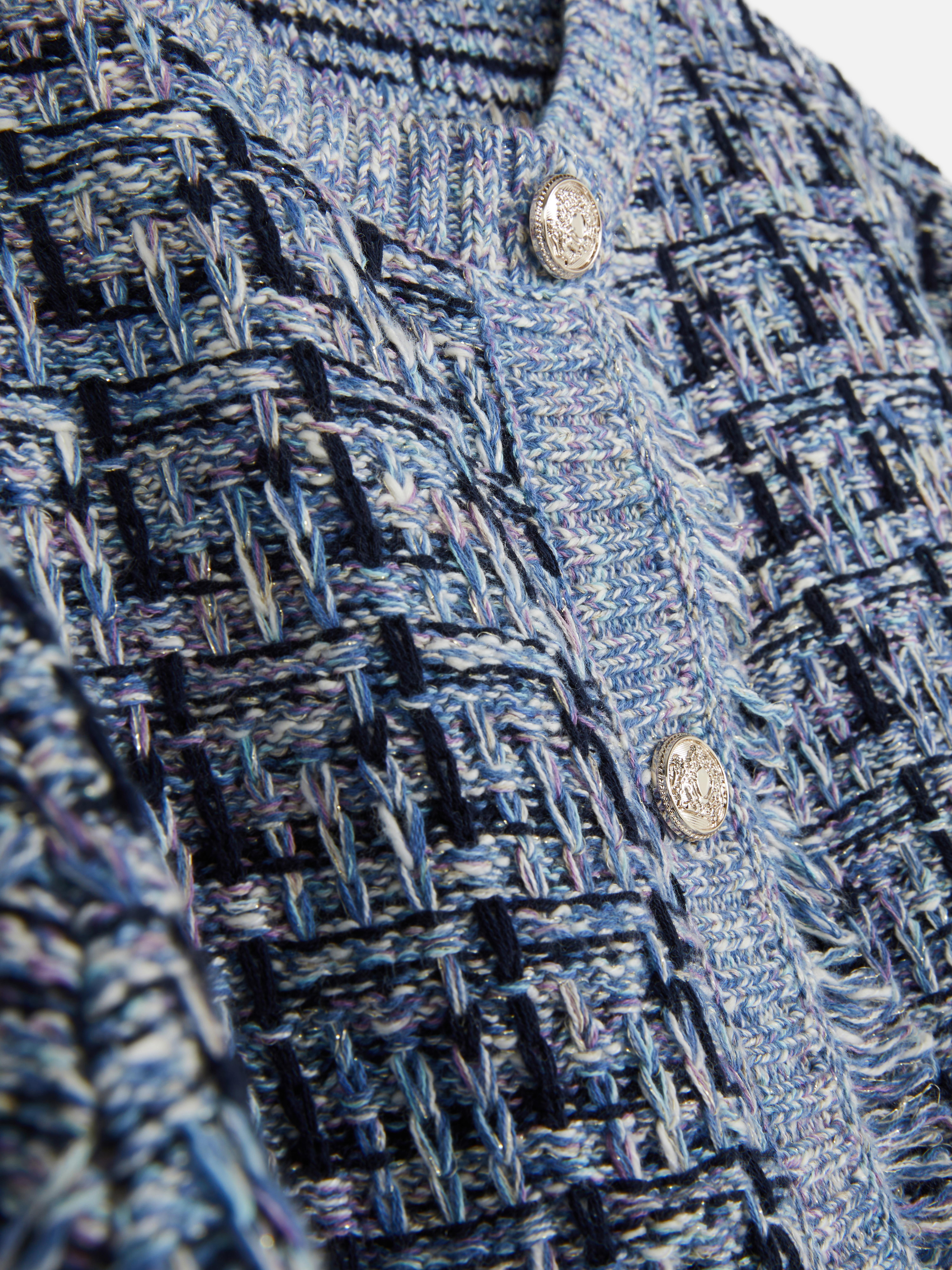Skinnende tweed-cardigan Hold det elegant med denne trendy tweed-cardiganen