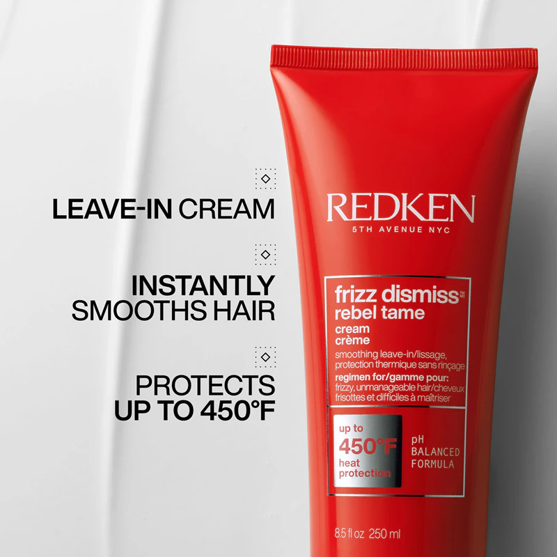 creme protetor térmico Redken Frizz Dismiss suaviza os cabelos rebeldes.