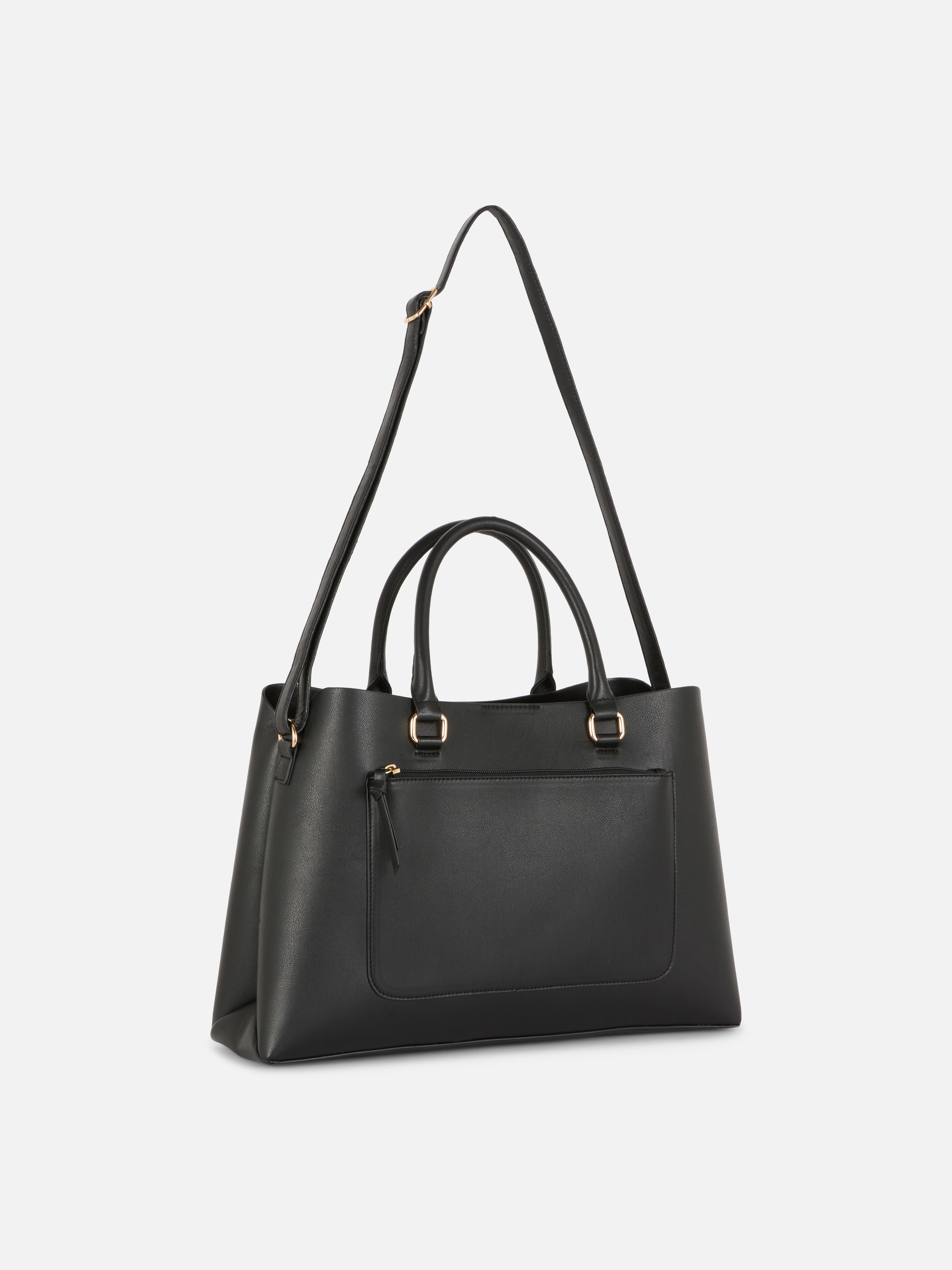 Geantă tote din piele ecologică cu buzunar cu fermoar. Geanta ta tote de zi cu zi este acum și mai elegantă, din piele ecologică cu buzunare.