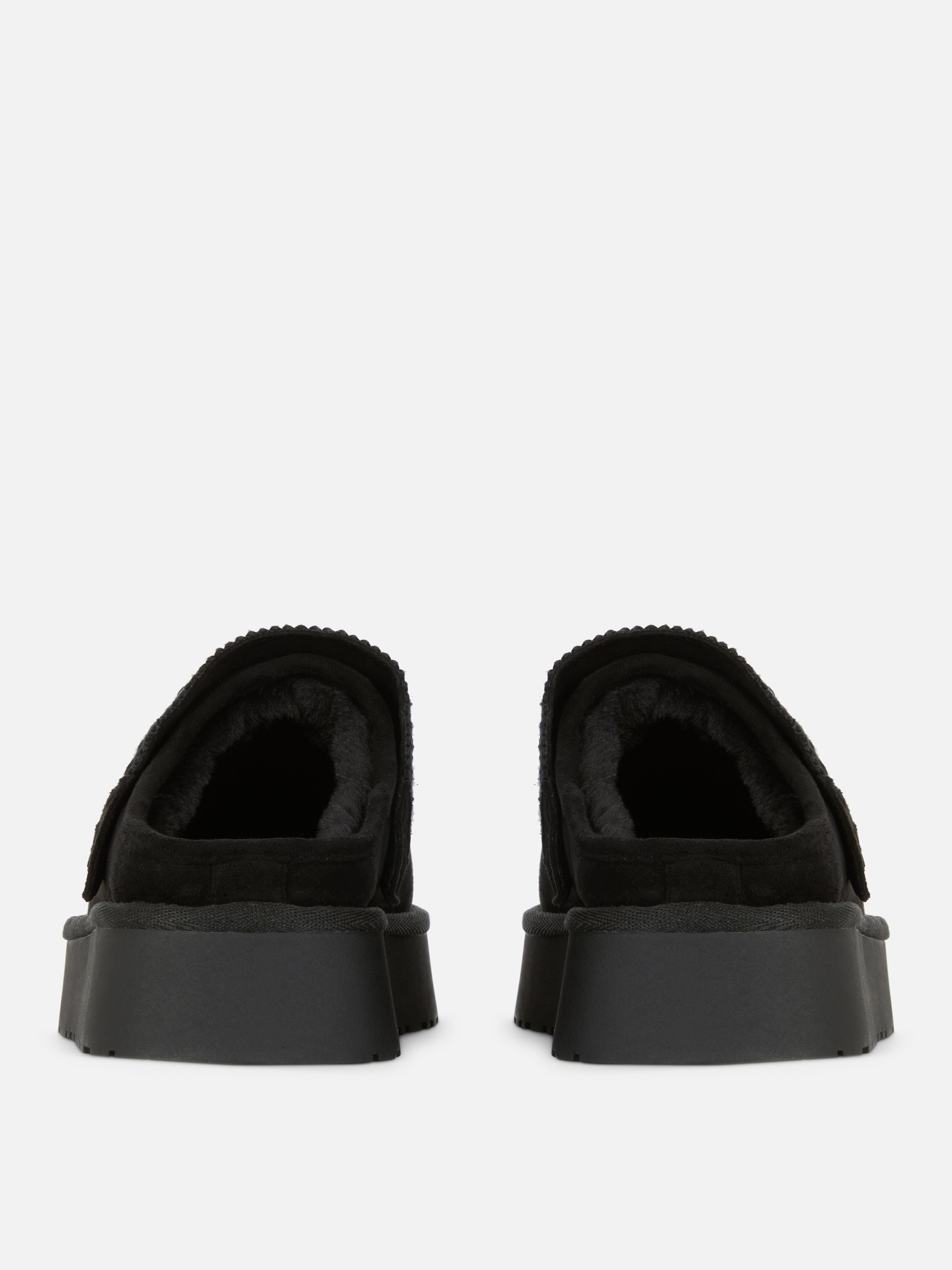 Saboți căptușiți Saboți cu slingback, căptușeală pufoasă și talpă groasă