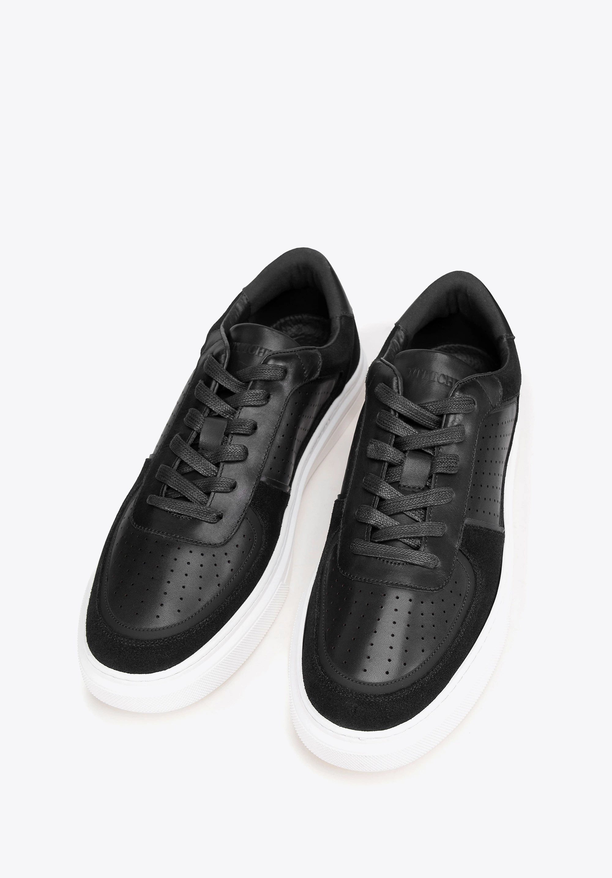 Męskie sneakersy ze skóry z perforacjami czarne
