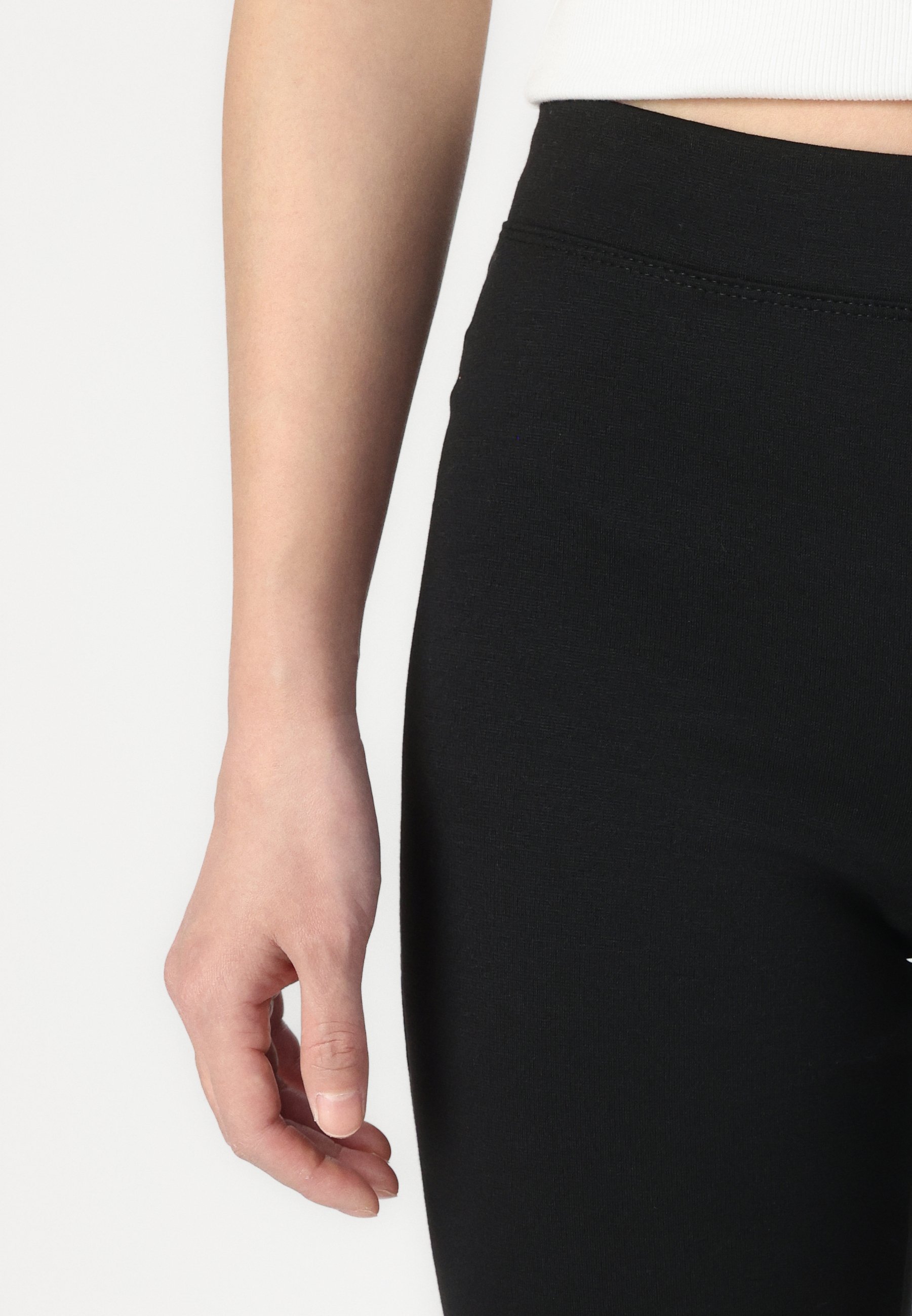 ONLY ONLFEVER FLARED PANTS - Legginsit - Housut - black