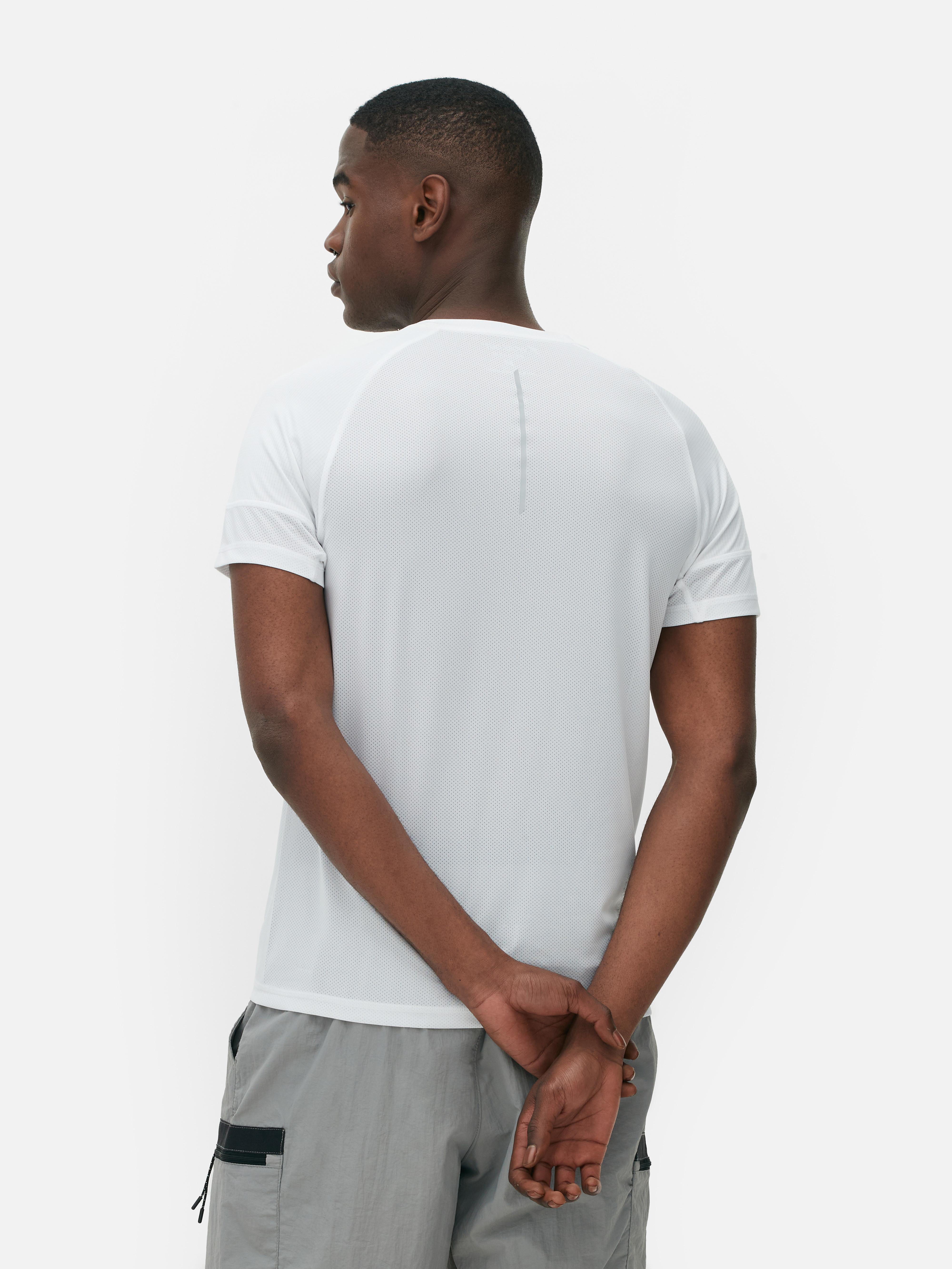 Tricou sport cu mânecă scurtă Extinde-ți colecția de articole sportive cu acest tricou cu guler rotund, mâneci scurte și logo reflectorizant