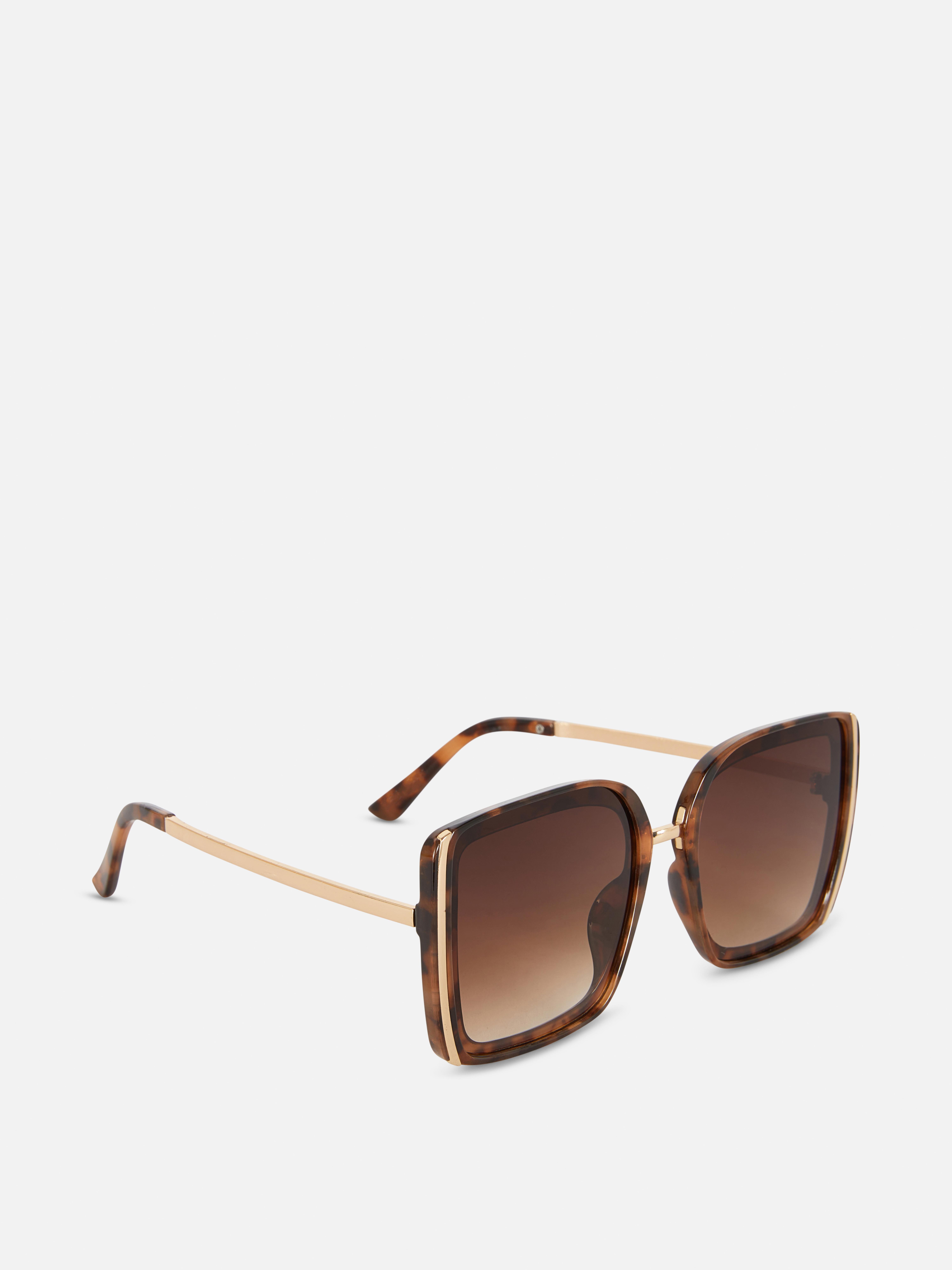 Ochelari de soare supradimensionați cu ramă pătrată. Ochelari de soare în stil vintage cu ramă pătrată XL și brațe subțiri.