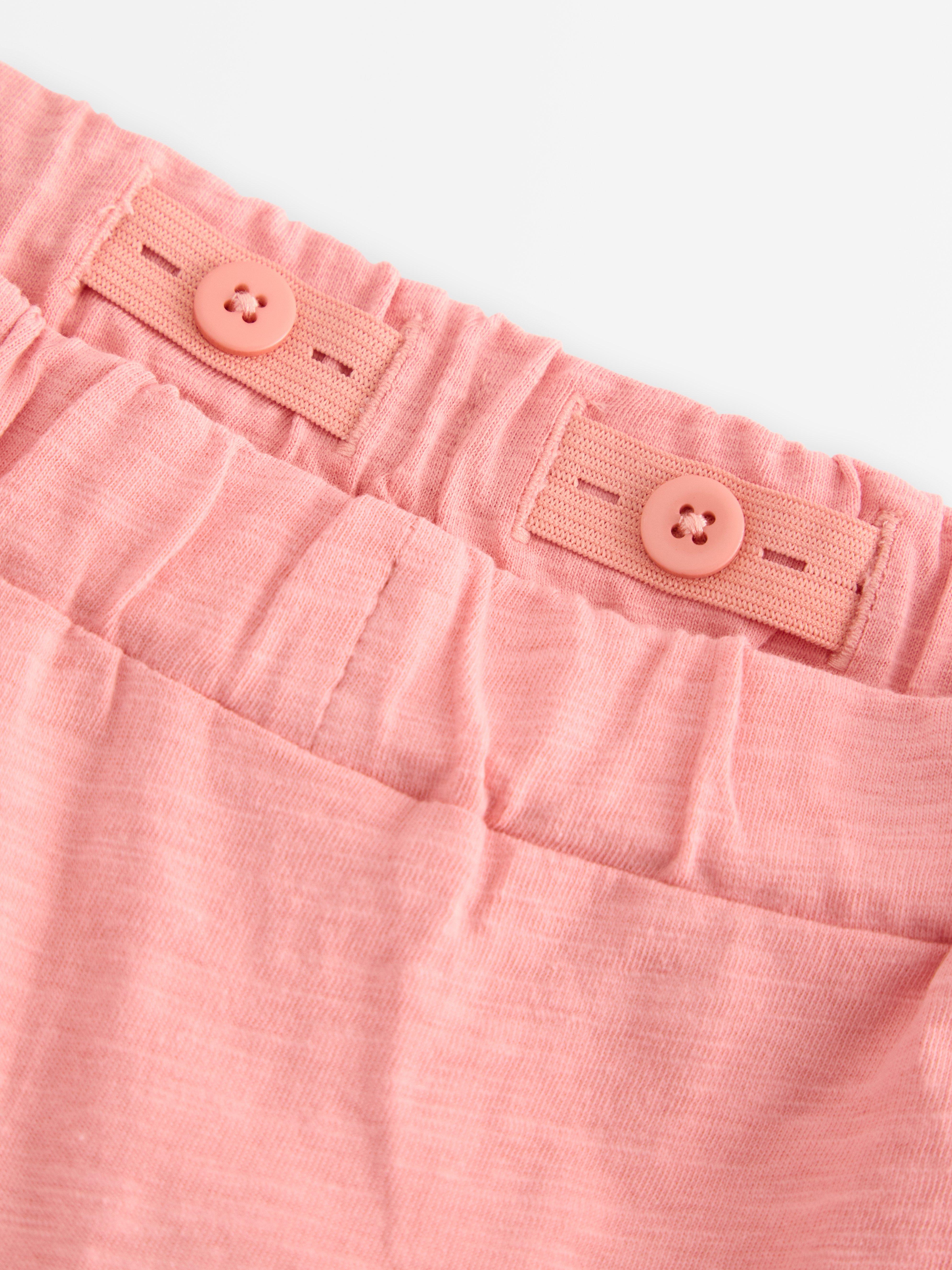 Falda culotte con volantes rosa