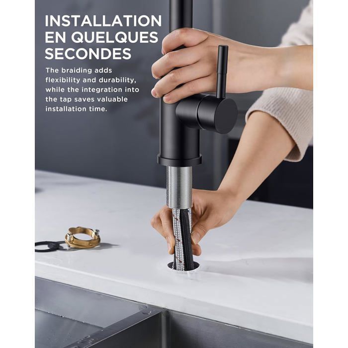 Grifo de cocina negro, con cabezal rociador extraíble y caño giratorio de 360°. Control único para agua fría y caliente.