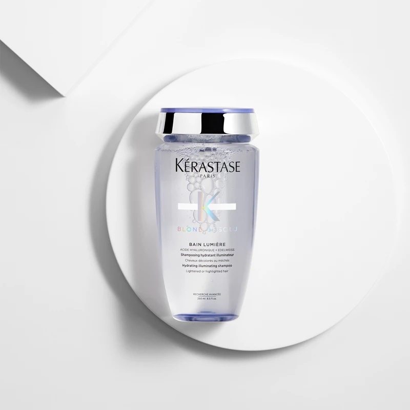 Kérastase Blond Absolu Bain Lumière šampūnas balintiems arba sruogelėmis sruogelėmis dažytiems plaukams
