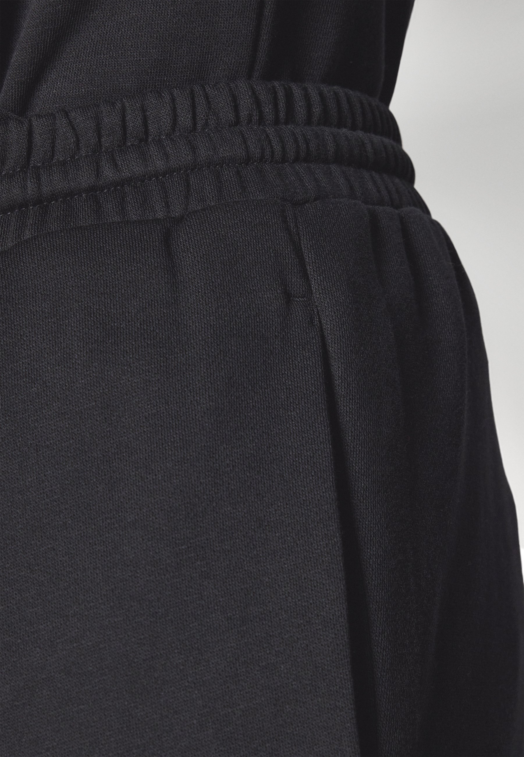 adidas Sportswear FEELCOZY - Trainingsbroek - zwart/wit