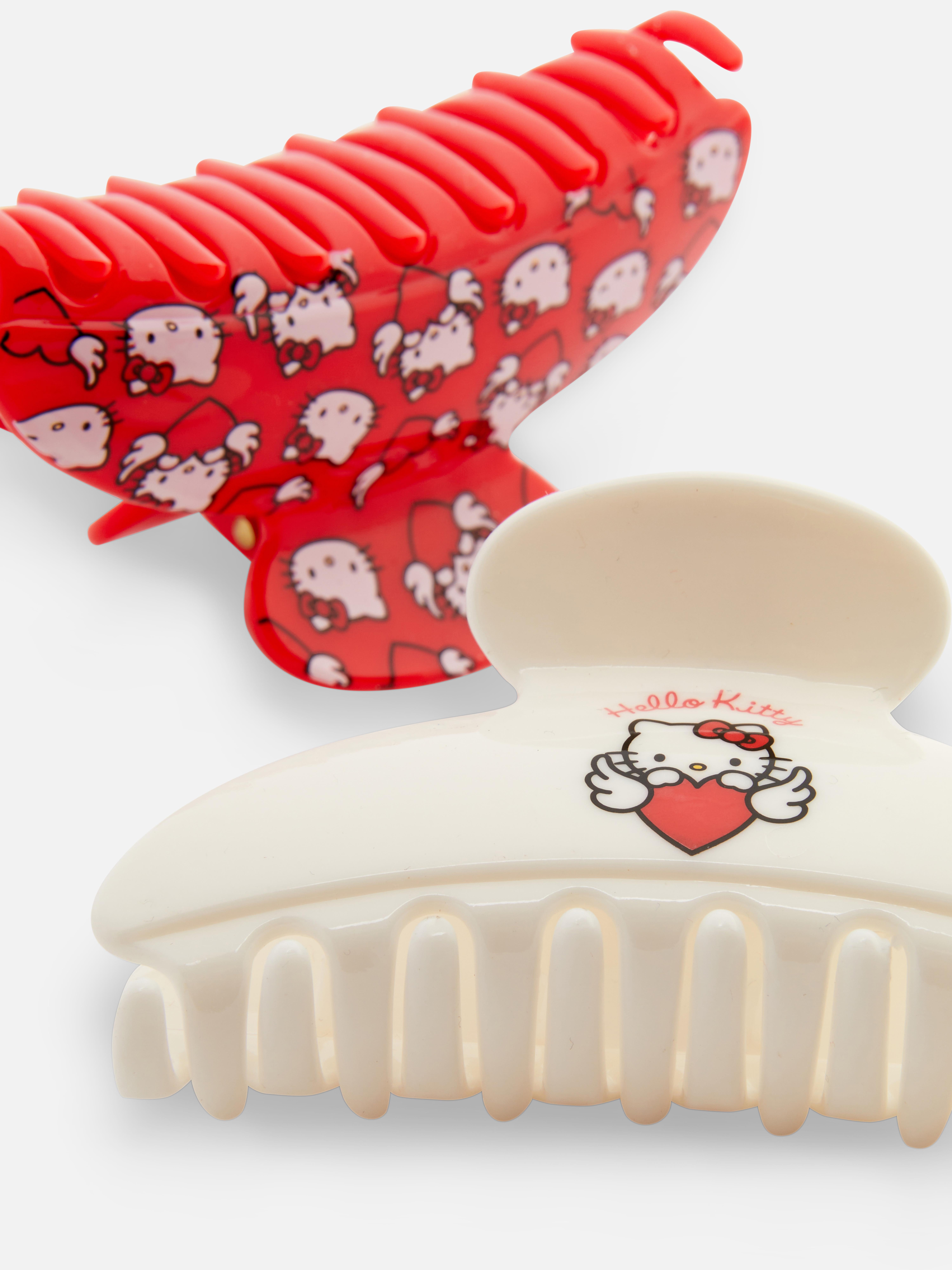 Agrafe de păr Hello Kitty, set de 2. Două agrafe de păr cu un design Hello Kitty? Da, vă rog.