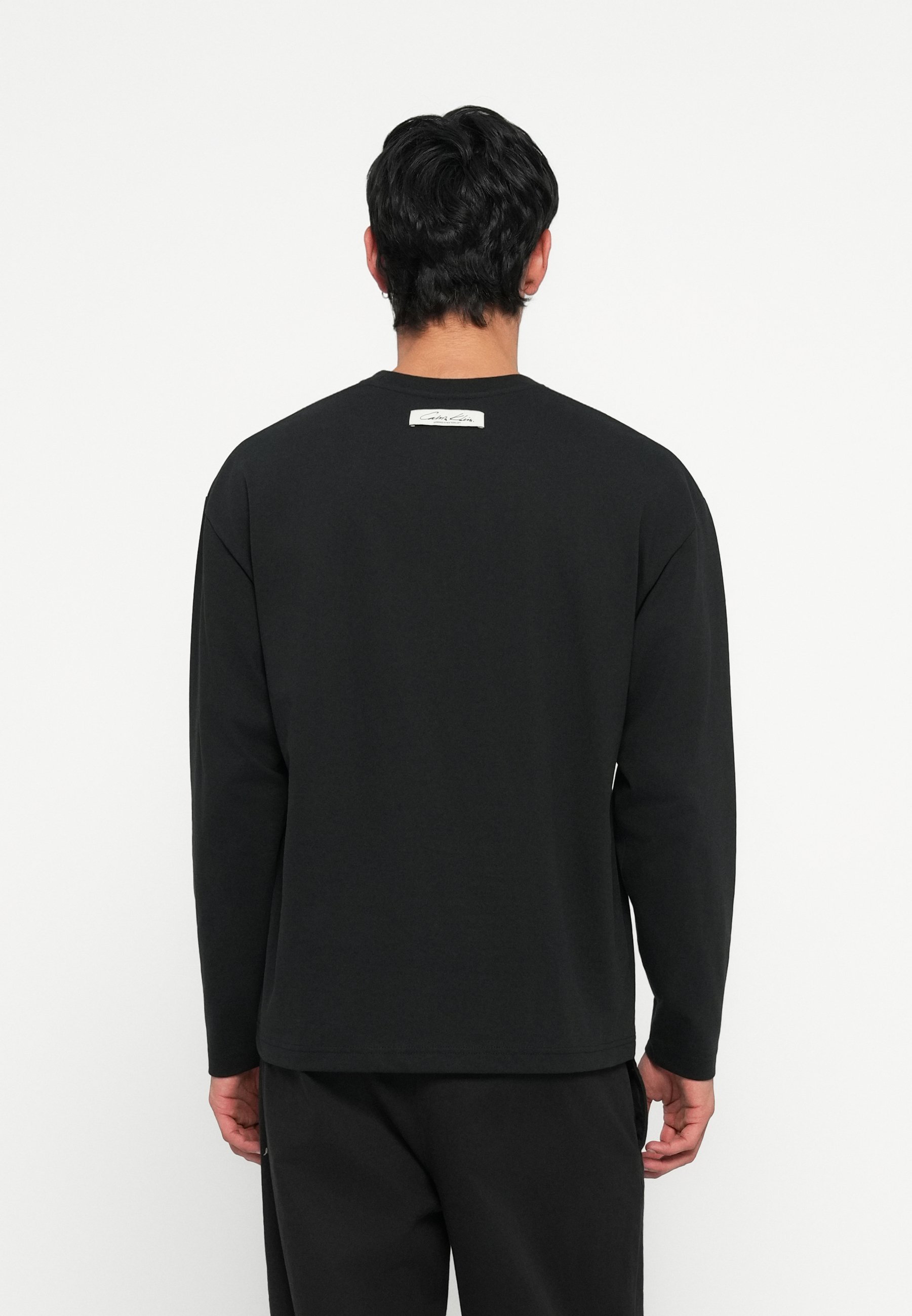Camiseta Calvin Klein Oversized com Estampa - Blusa de manga comprida - preta