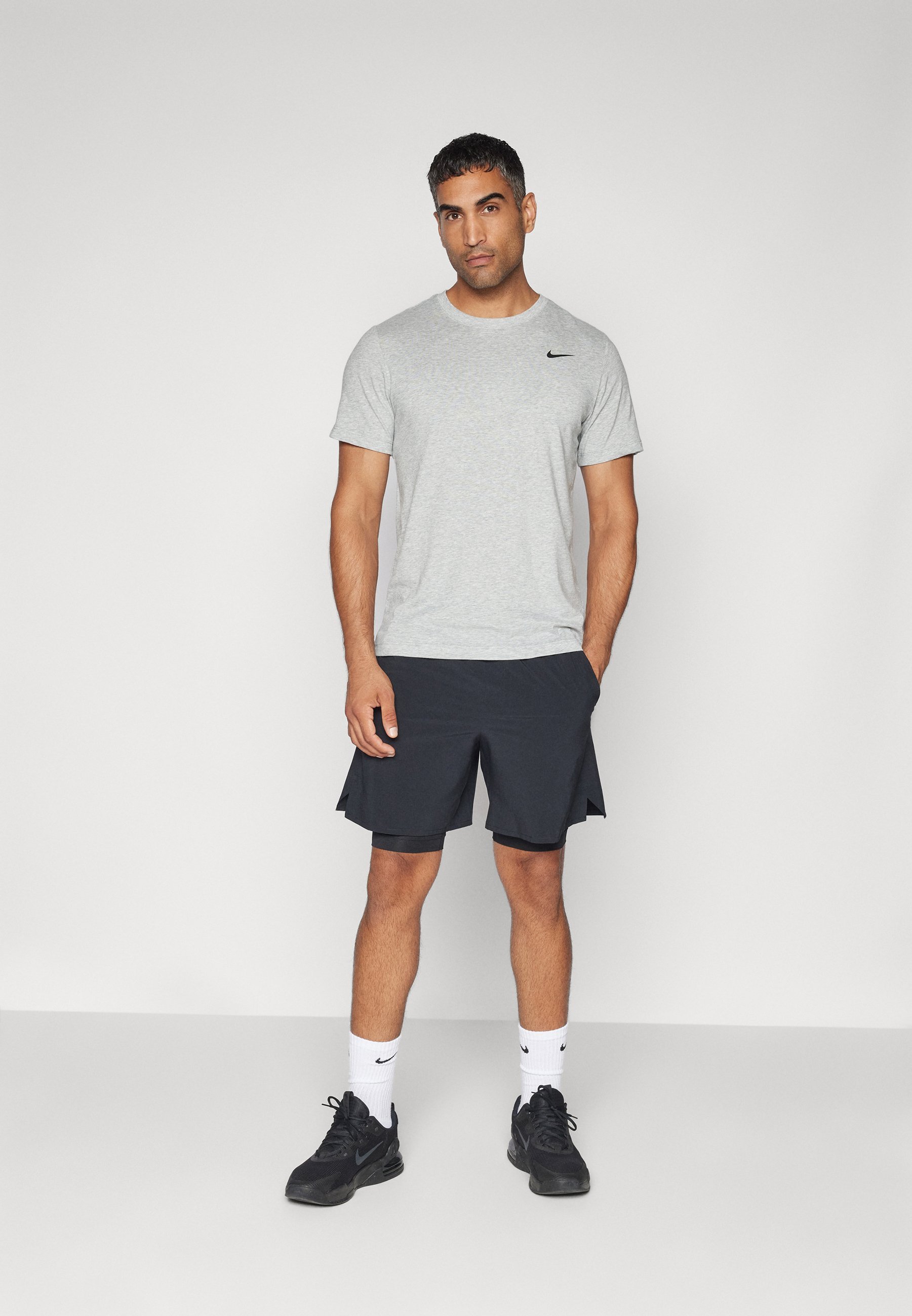 Nike Performance CREW SOLID - Sport T-shirt - donkergrijs gemêleerd/zwart