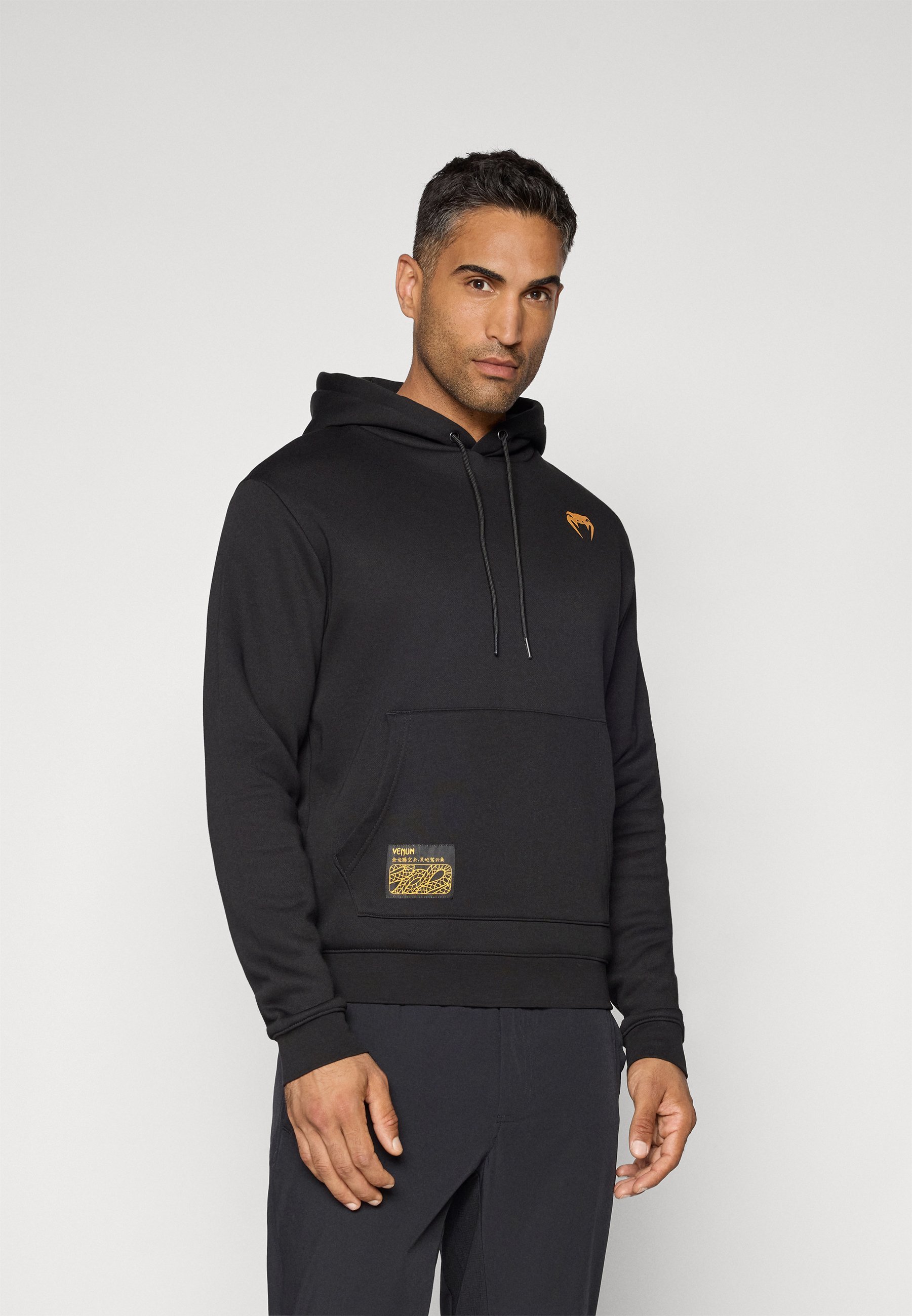 Sweat à capuche Venum SERPENTI - Noir/argenté/doré