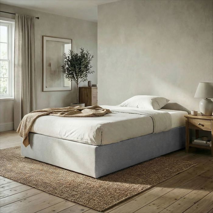 Base de cama tapizada MAYA de 90 x 190 cm, estructura de madera y revestimiento de tela gris, estructura de cama con patas.