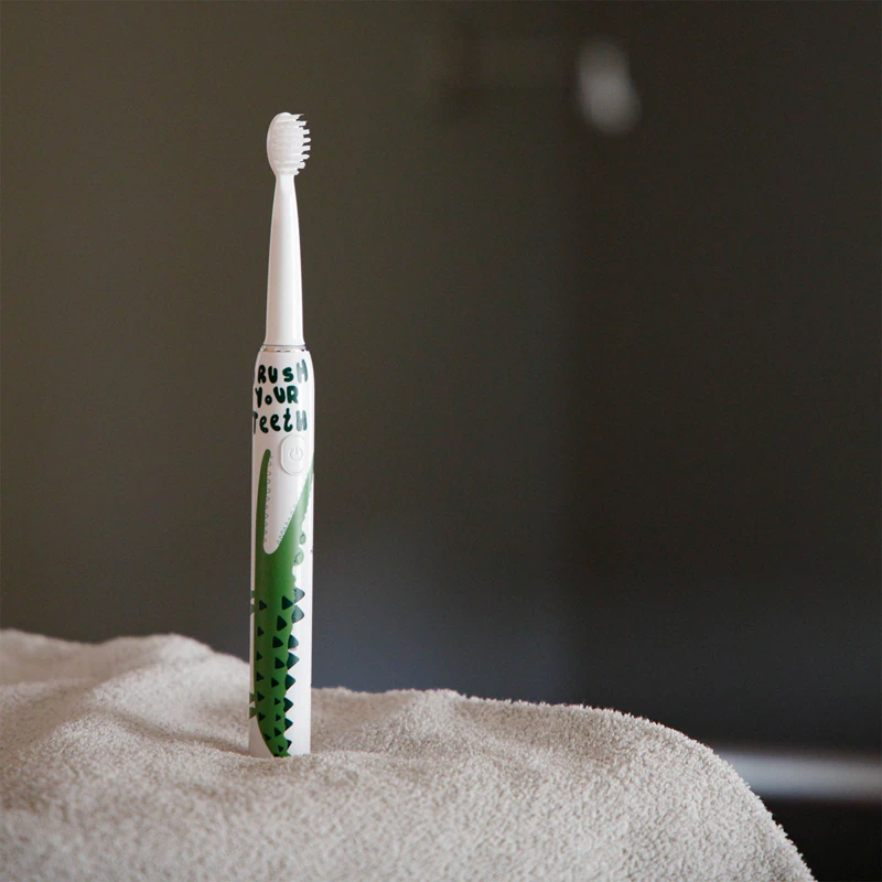 Escova de dentes sônica innoGIO GIOSonic Crocodile para crianças