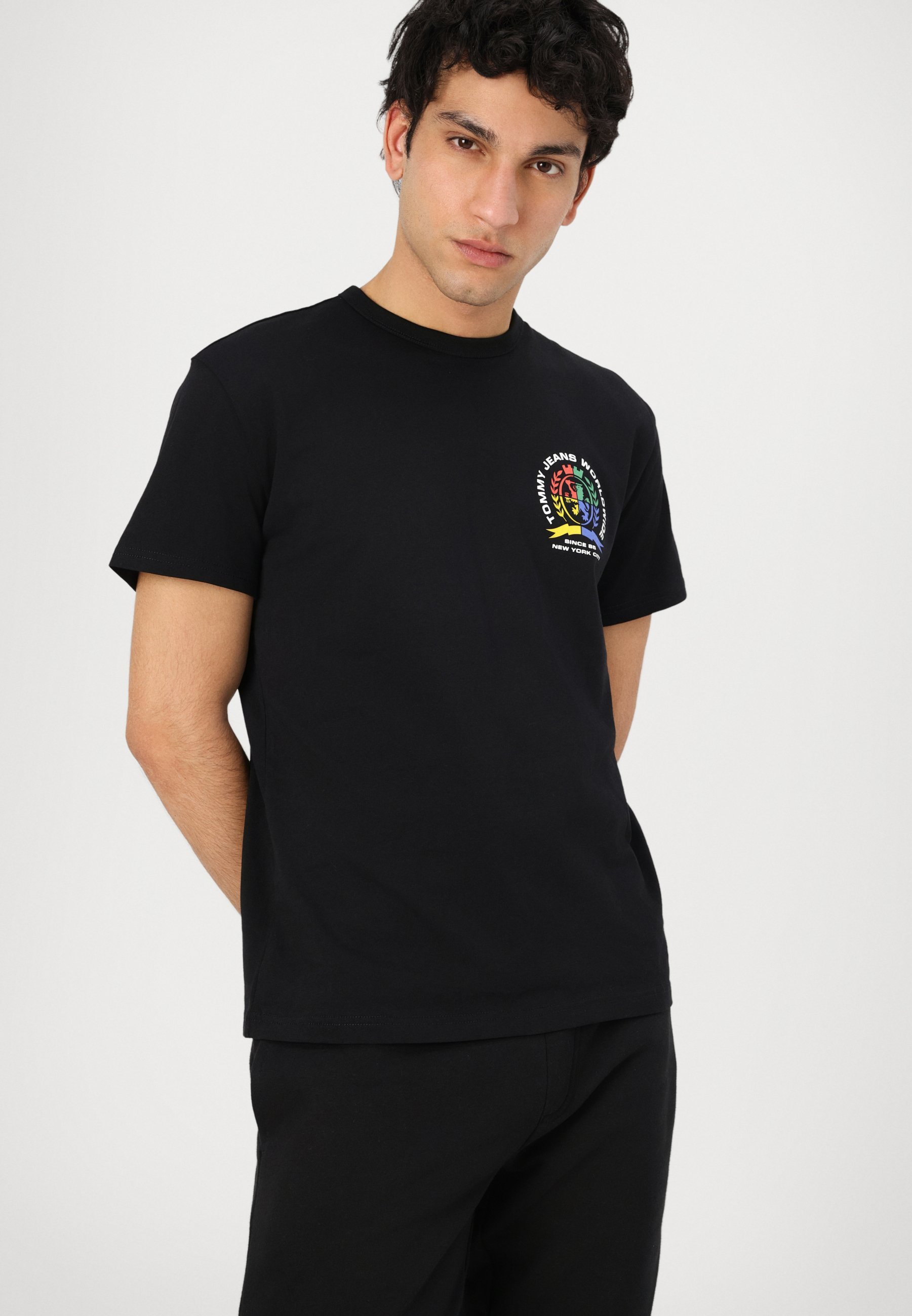 Tommy Jeans TJM SLIM S FLAG - Trainingsbroek - zwart
