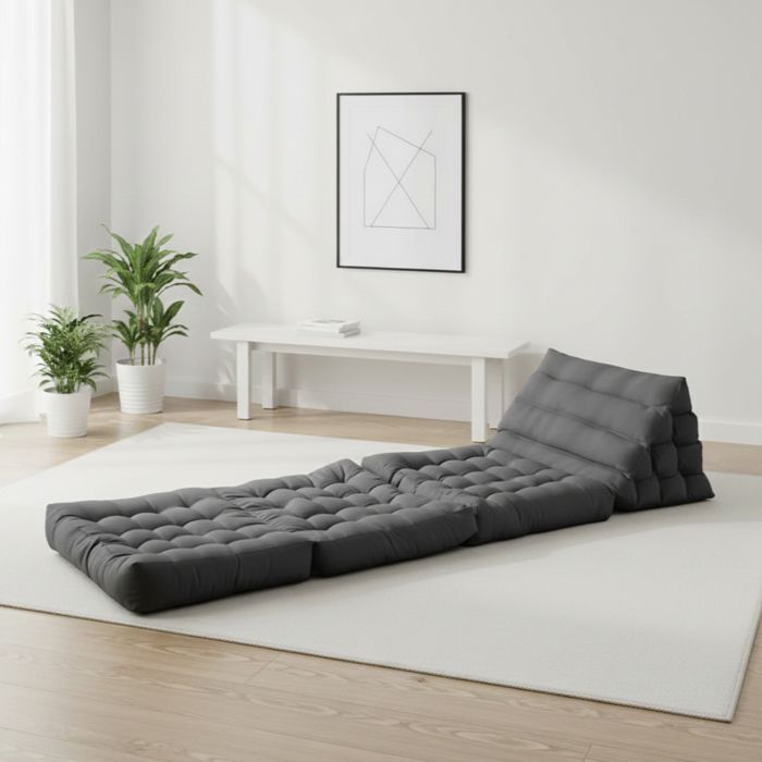 Colchón modular individual para suelo en poliuretano gris oscuro.