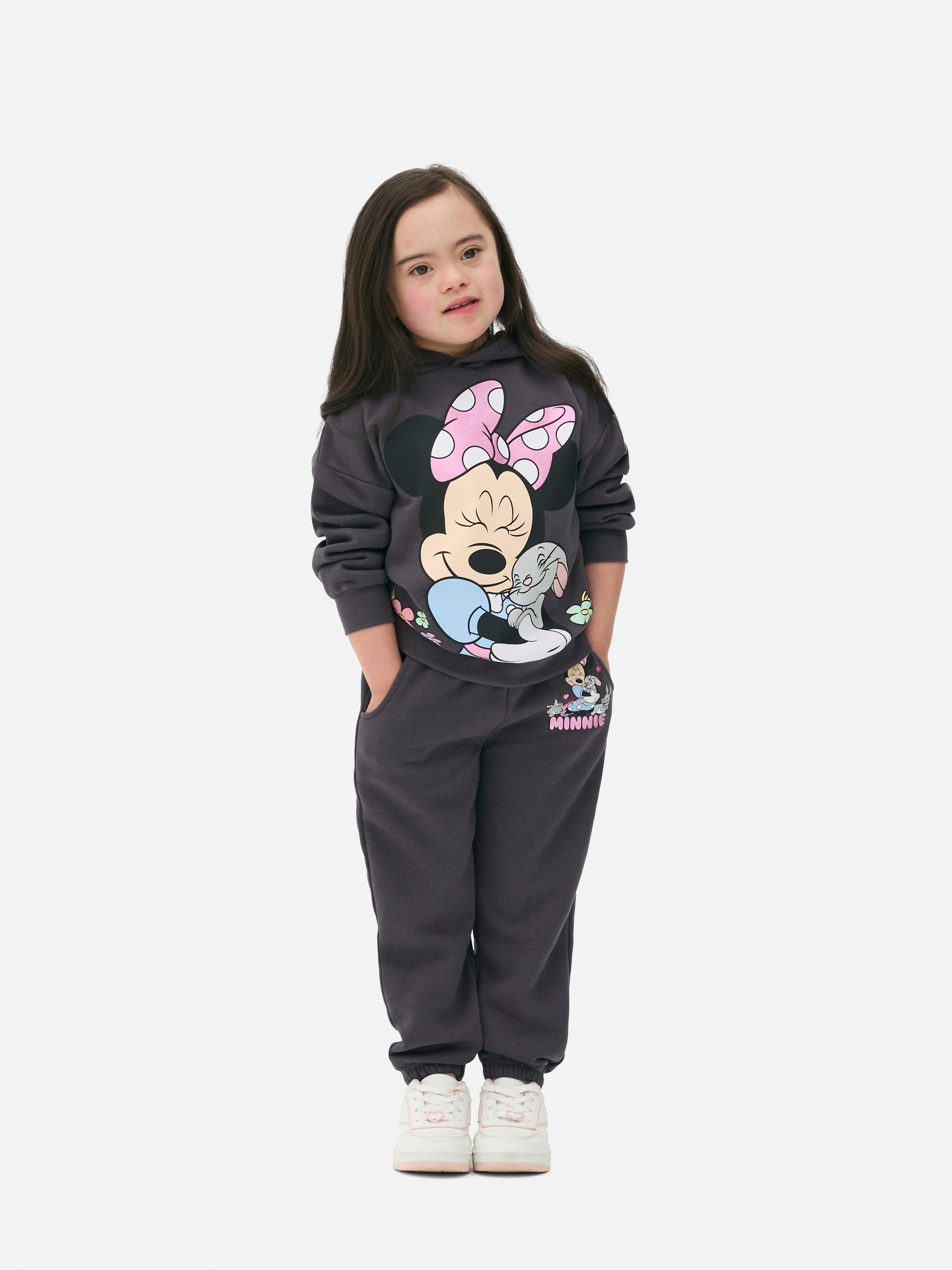 Hanorac asortat cu imprimeu Disney Minnie Mouse. Un hanorac cu manșete striate și un imprimeu cu Minnie Mouse îmbrățișând un iepure.