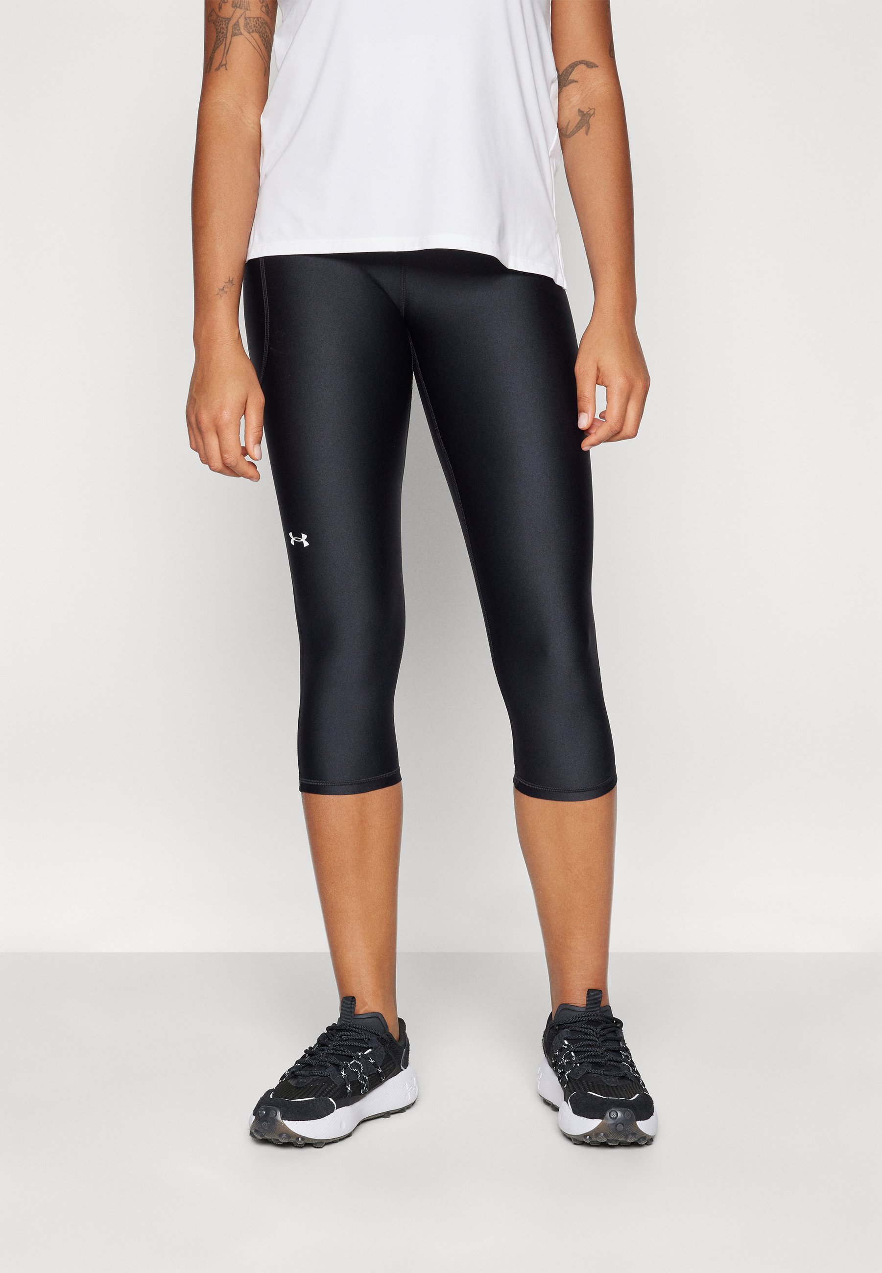 Pantaloni sportivi Under Armour HI CAPRI - 3/4 - neri