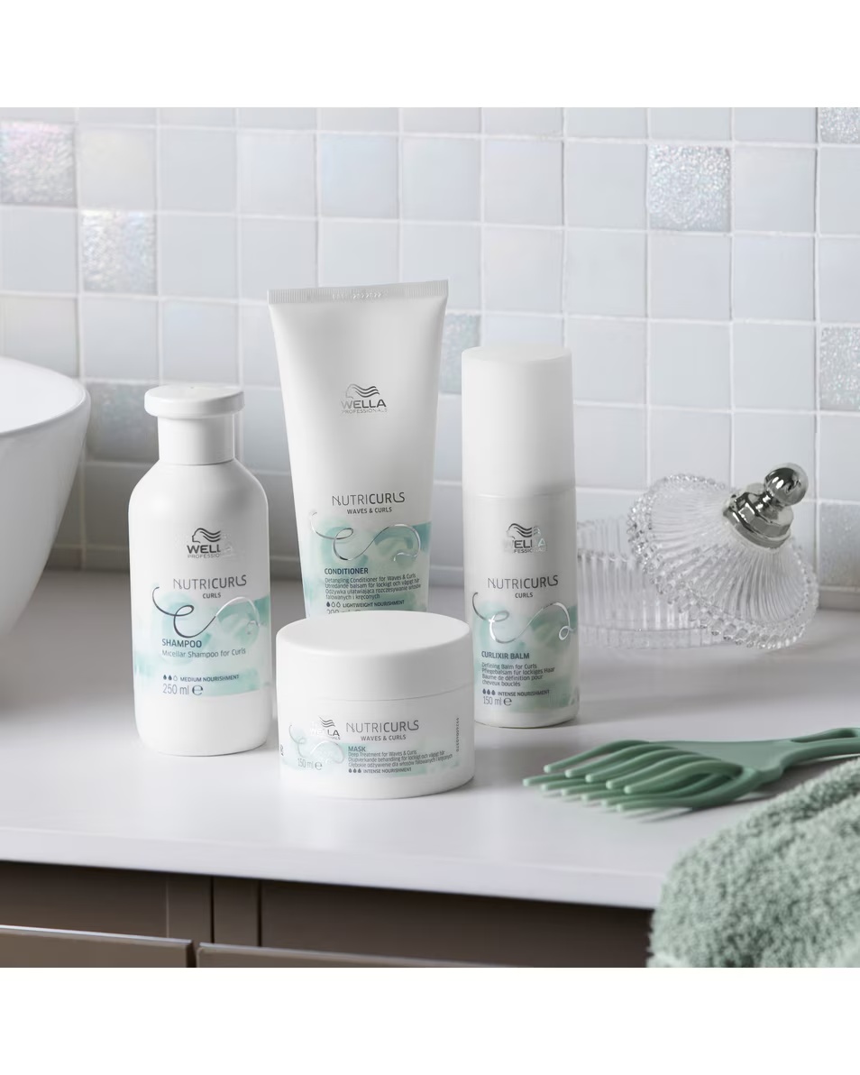 WELLA PROFESSIONALS Nutricurls Balsam descurcător pentru onduleuri și bucle