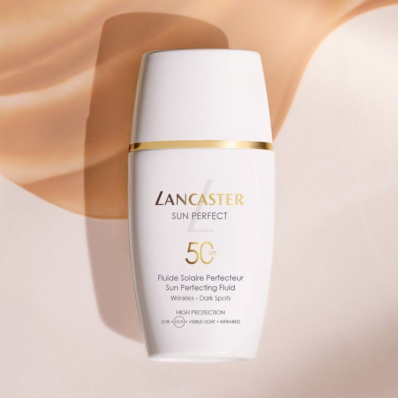 „Sun Perfecting Fluid“ veido apsaugos nuo saulės priemonė su SPF 50 Prabangi kosmetika