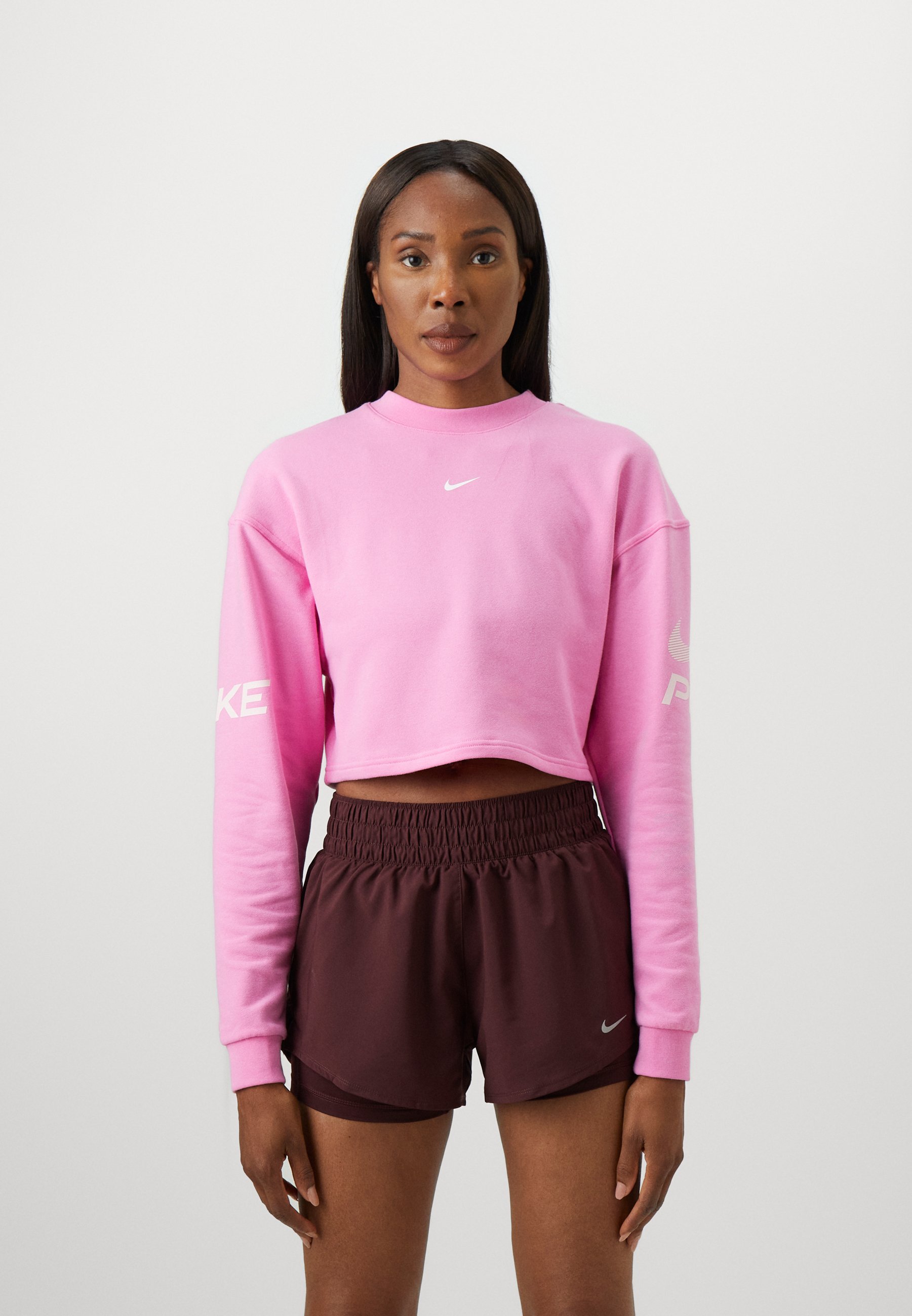 Sweat-shirt Nike Performance CREW - rose ludique/mousse rose