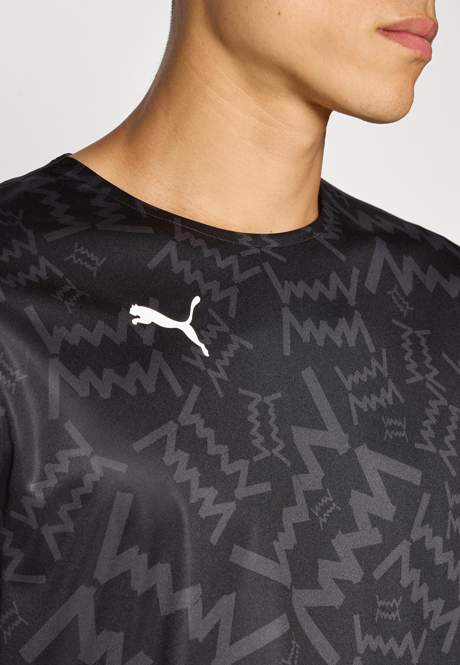 Puma TEAMJAWS Grafik-Schießshirt – Langarmshirt – Schwarz