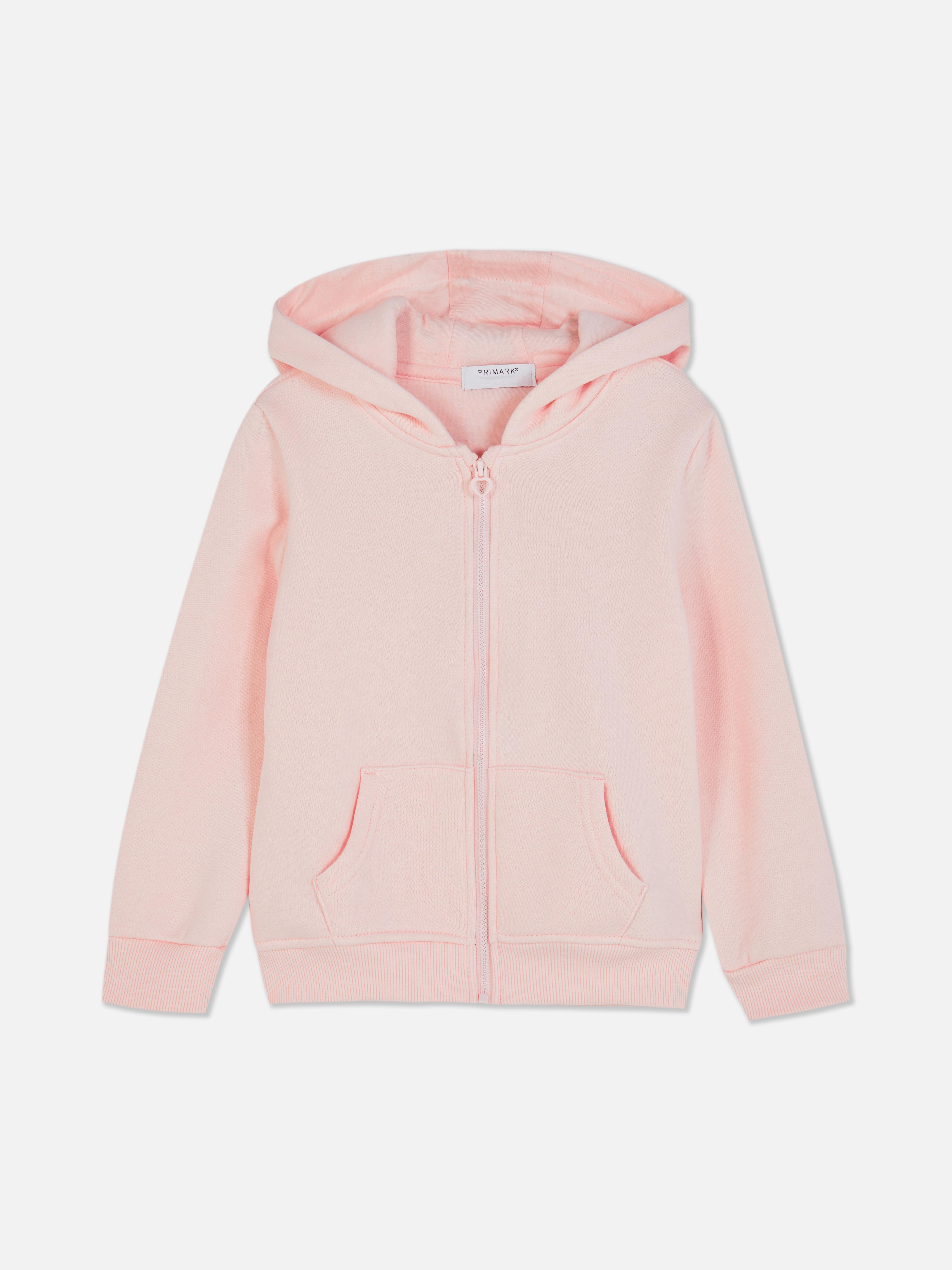 Kapuzenpullover mit durchgehendem Reißverschluss. Ein Kapuzenpullover mit praktischen Seitentaschen und einem herzförmigen Reißverschluss.