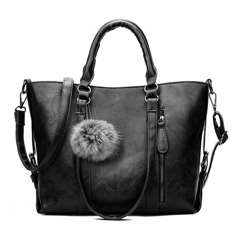 Sac bandoulière décontracté pour femme, grand sac à main en cuir PU de haute qualité avec pompon en fourrure et anse.