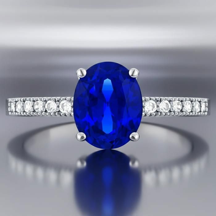 Damesring van gerhodineerd 925 sterling zilver – Intense blauwe kubische zirkonia – Ring bezet met zirkonia steentjes – Elegant sieraad met keurmerk – Cadeau-idee