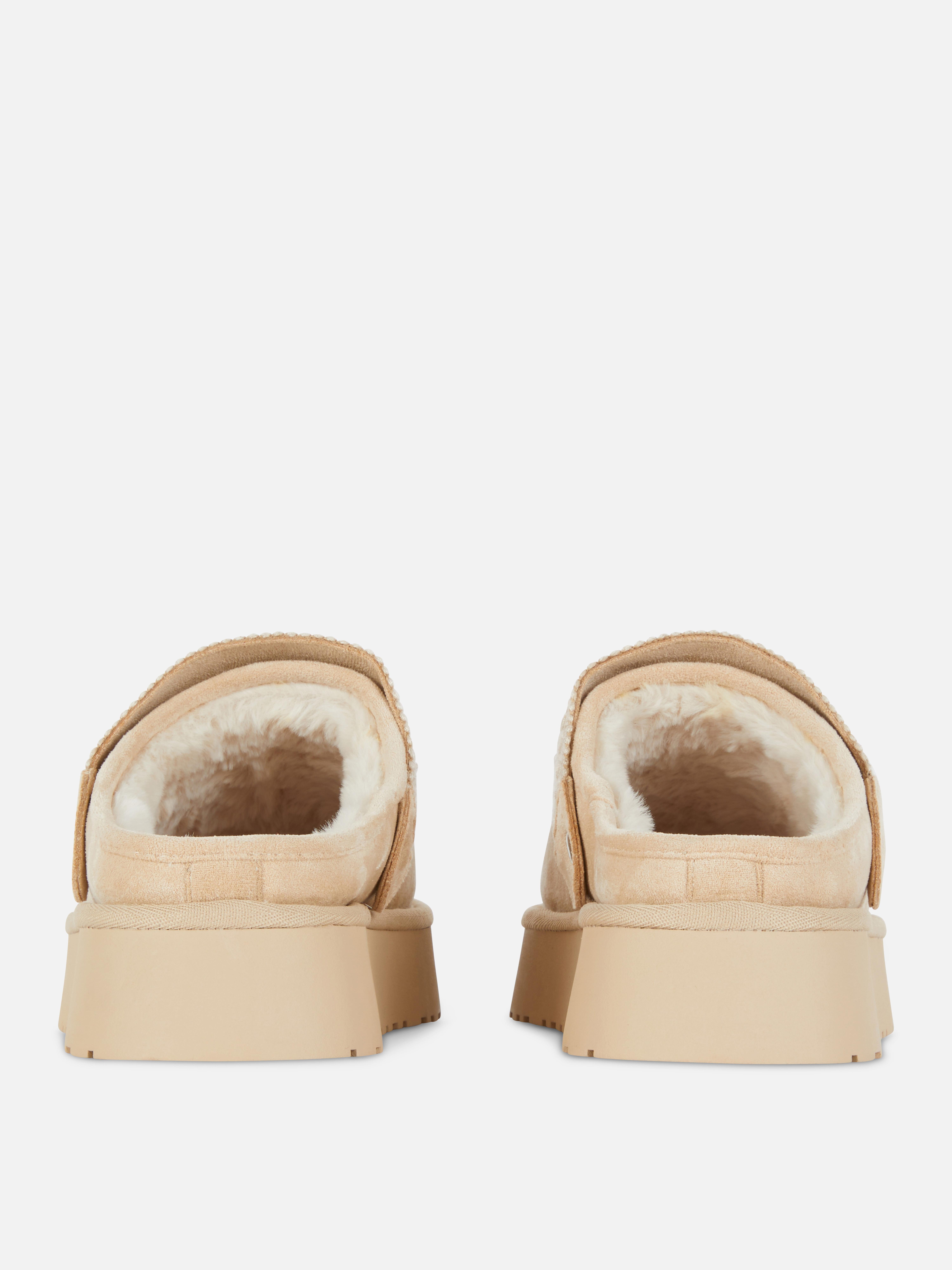 Saboți căptușiți Saboți cu slingback, căptușeală pufoasă și talpă groasă