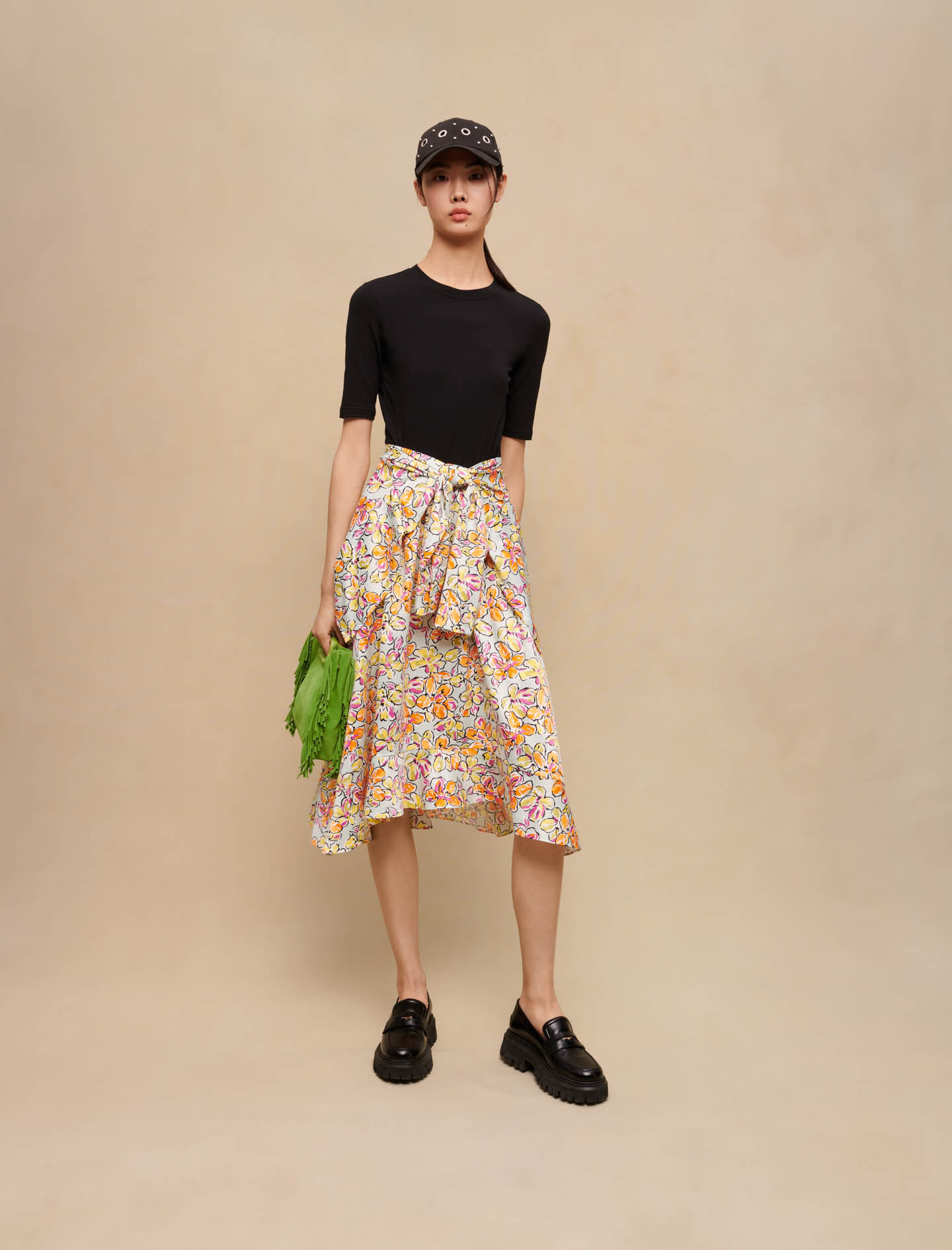 Rok met bloemenprint en knoopdetail - Hibiscus oranje/blauw