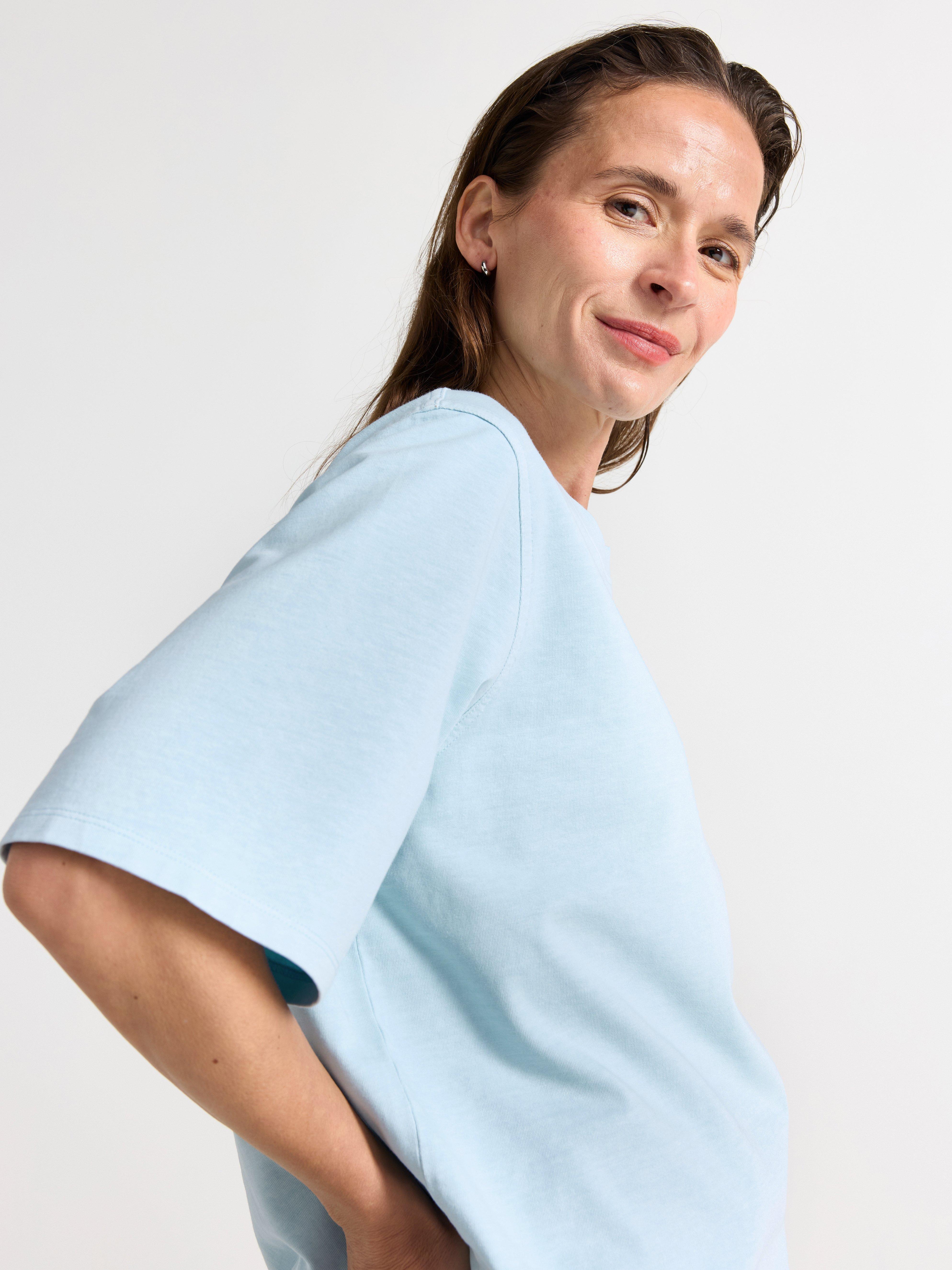 Camiseta oversized azul claro