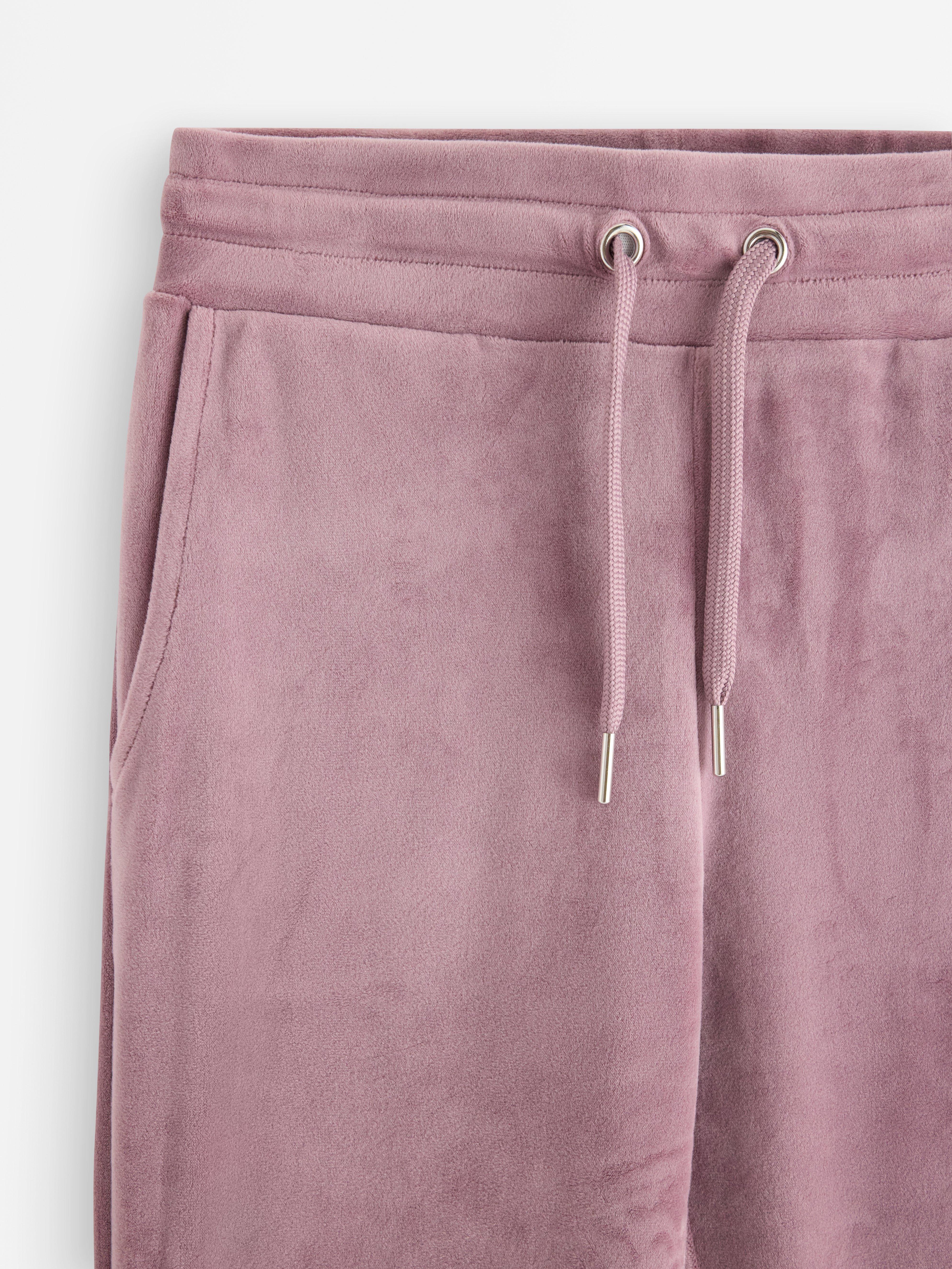 Utsvängda byxor i velour lilac