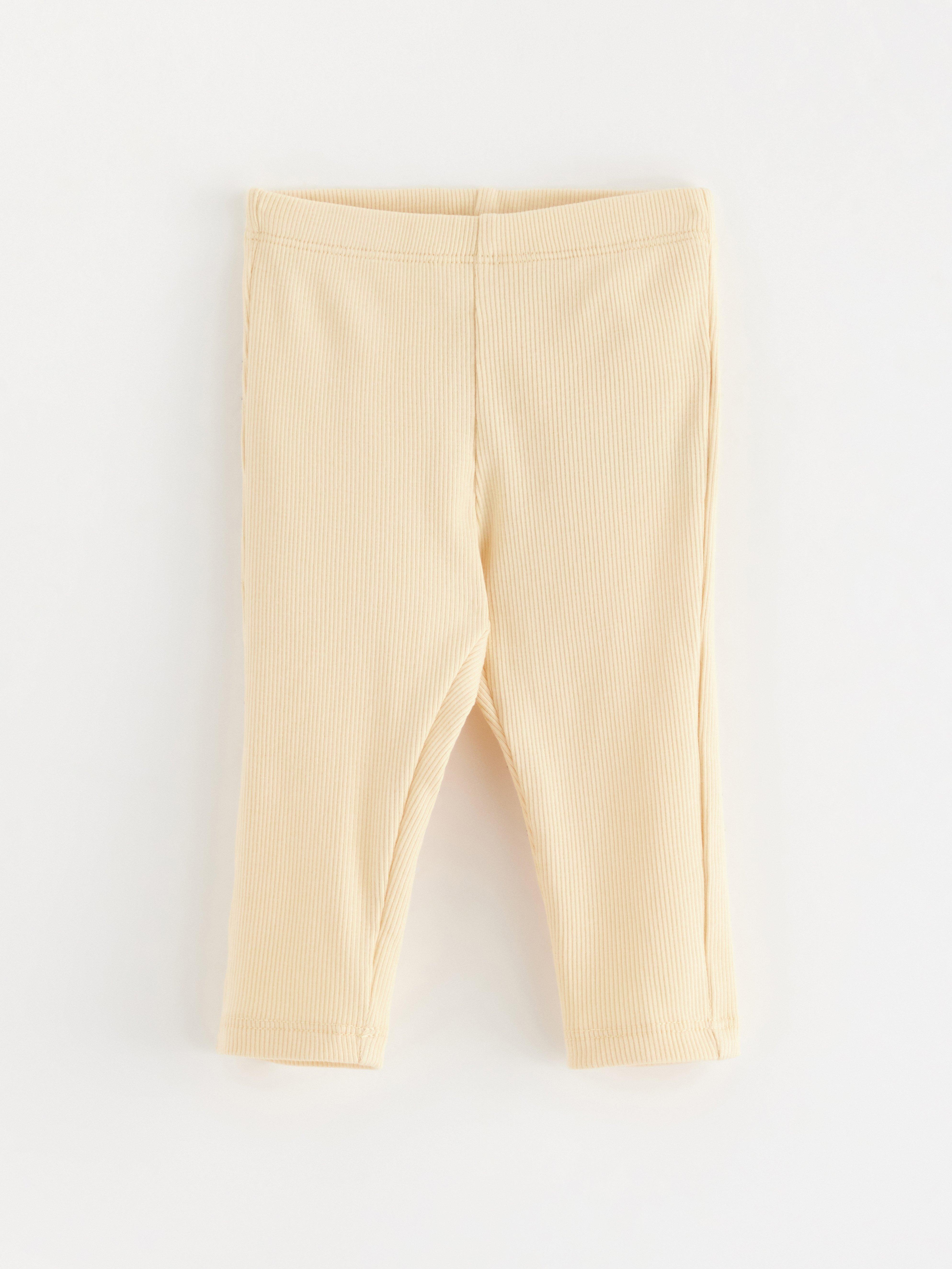 Leggings acanalados color amarillo claro empolvado