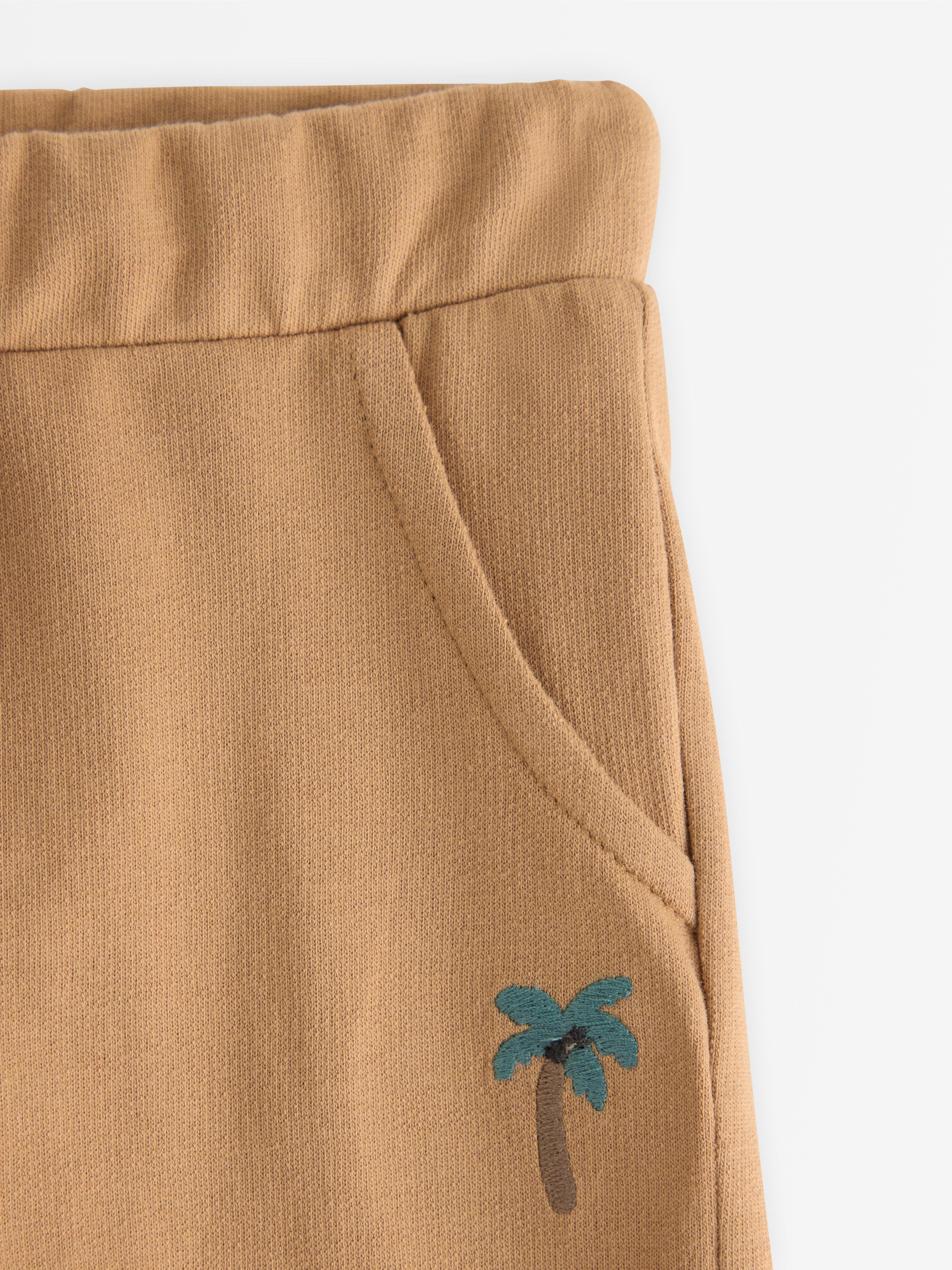 Pantalon de survêtement beige clair délavé