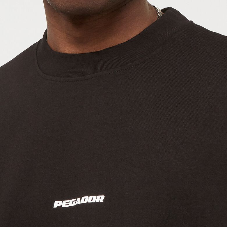 T-shirt boxy con logo
