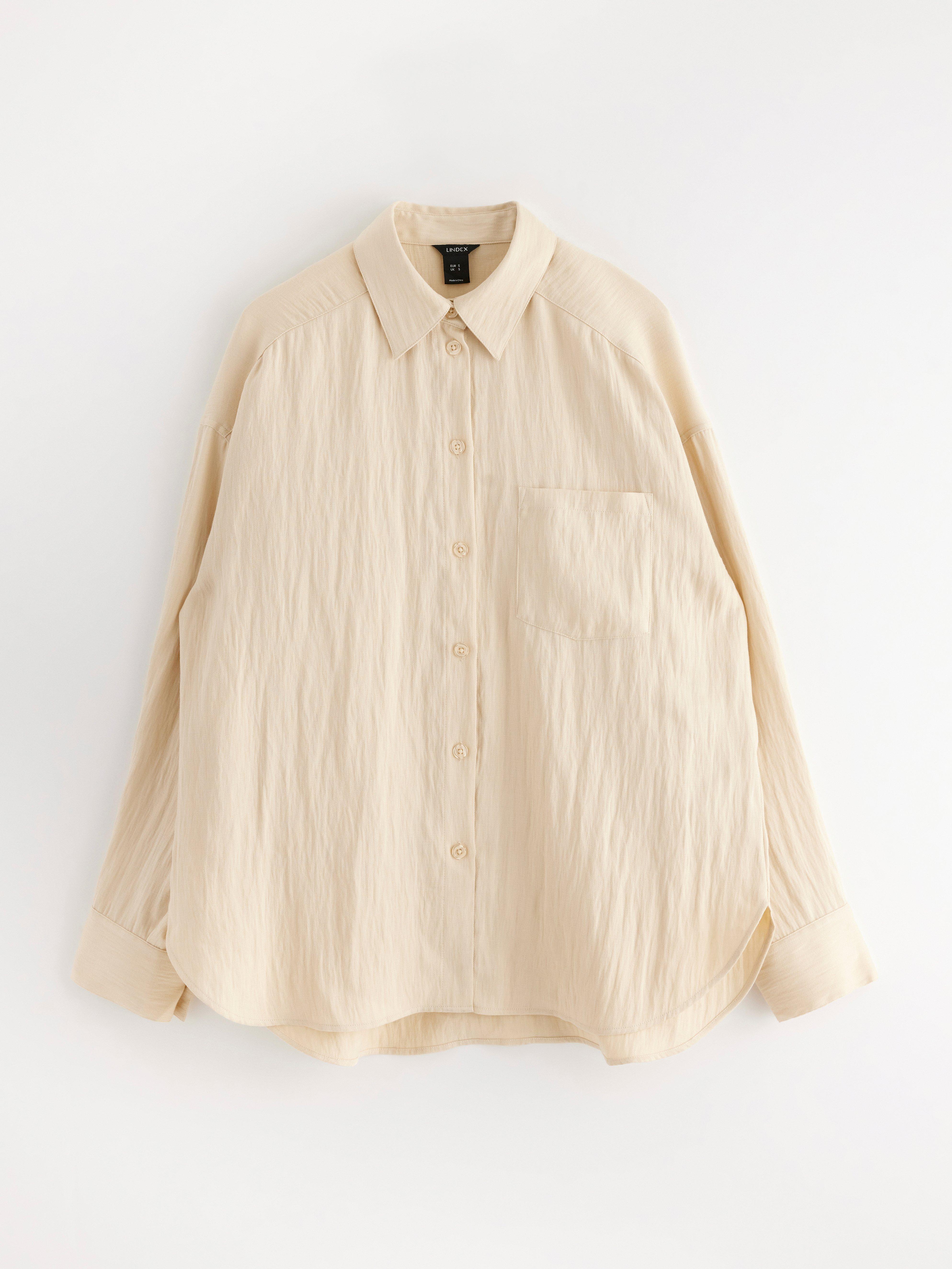 Camisa de manga larga color beige claro