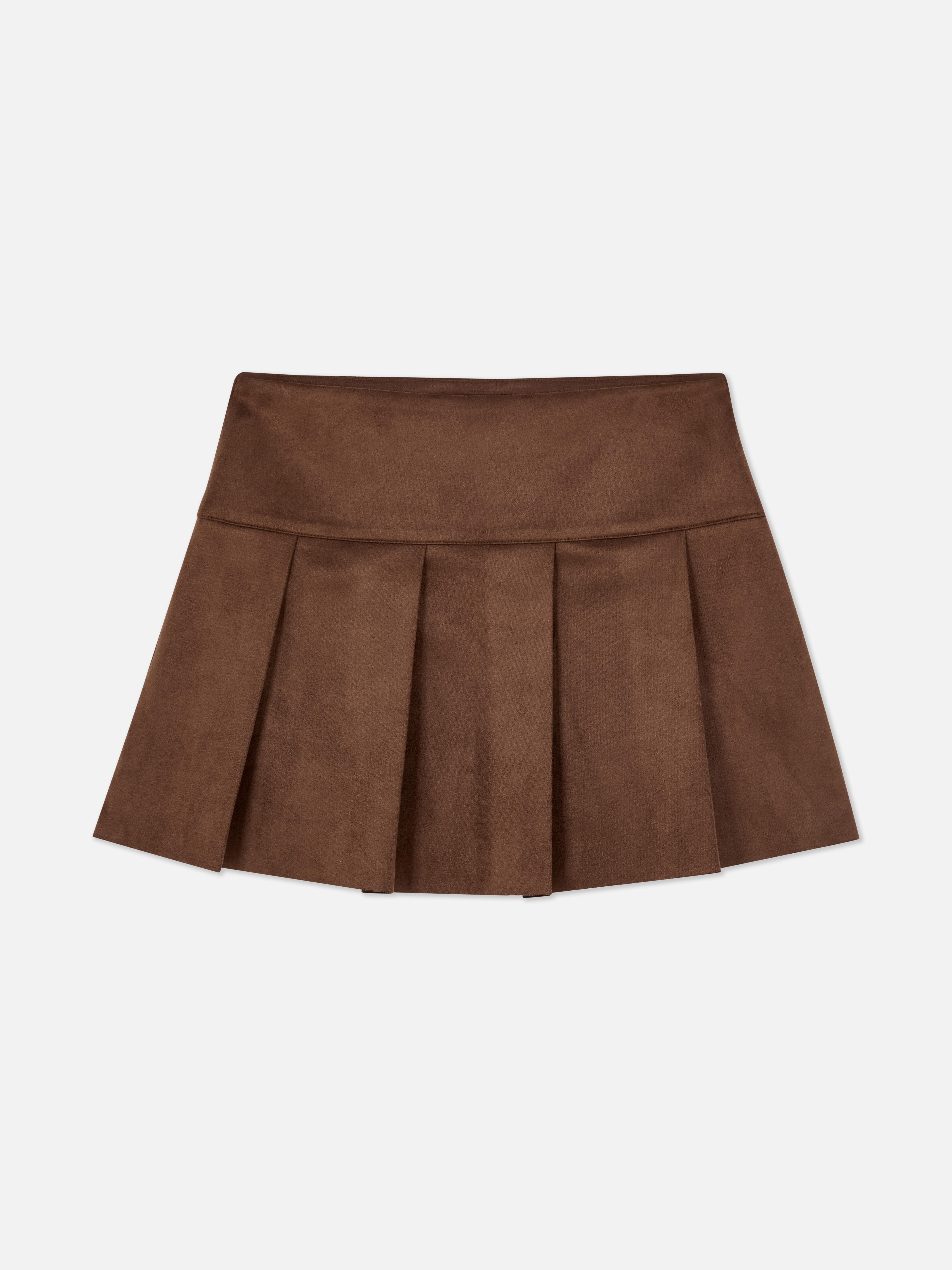 Suede pleated mini skirt A suede mini skirt with wide pleats and a side zipper