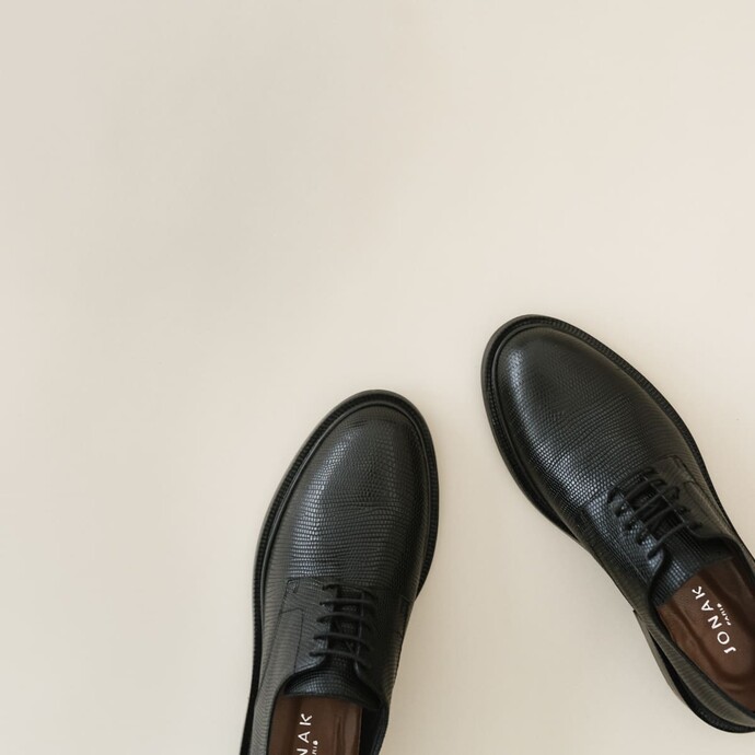 Derbies en cuir  reptile noir