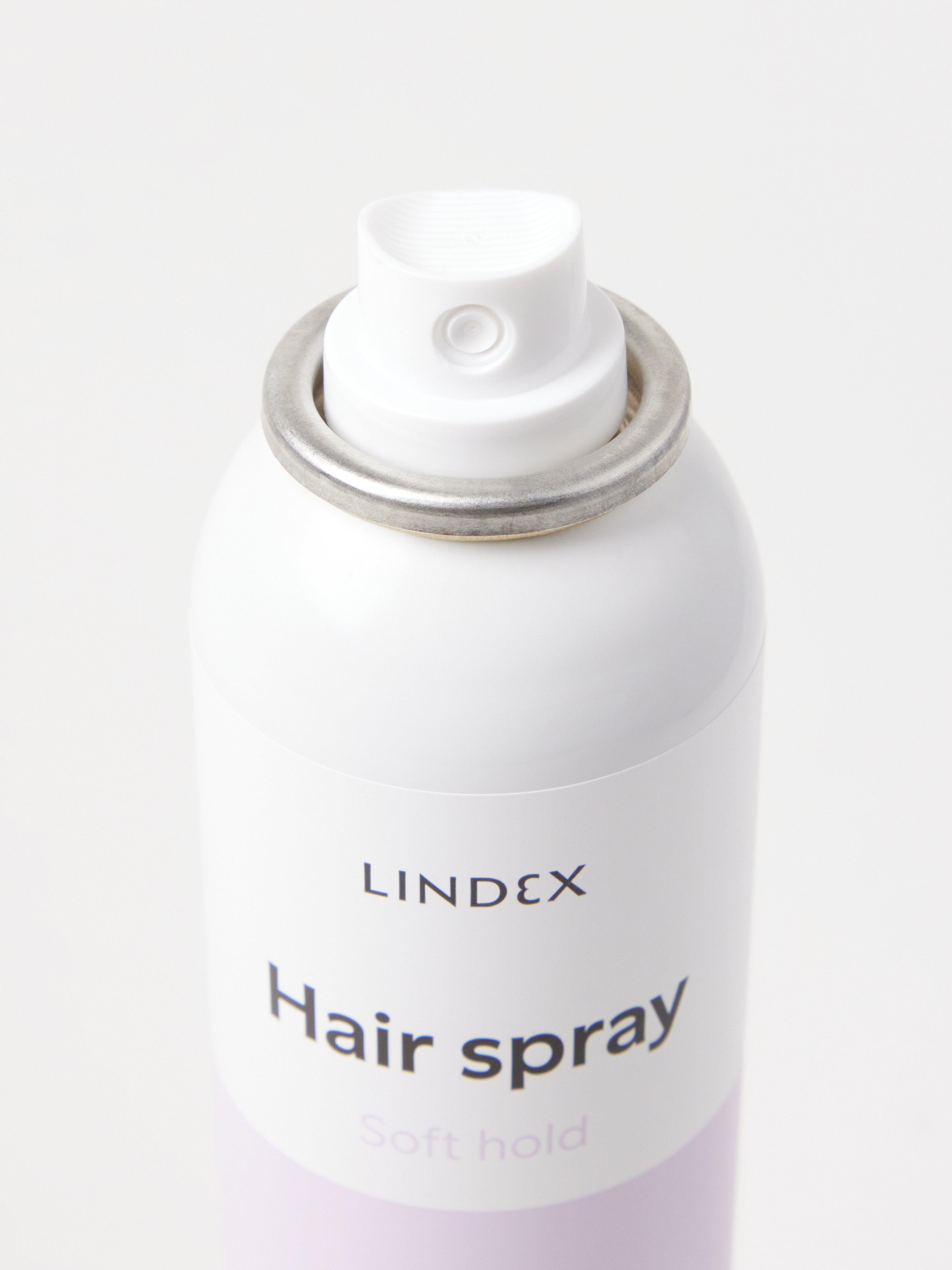 Lacca per capelli a tenuta leggera, senza coloranti