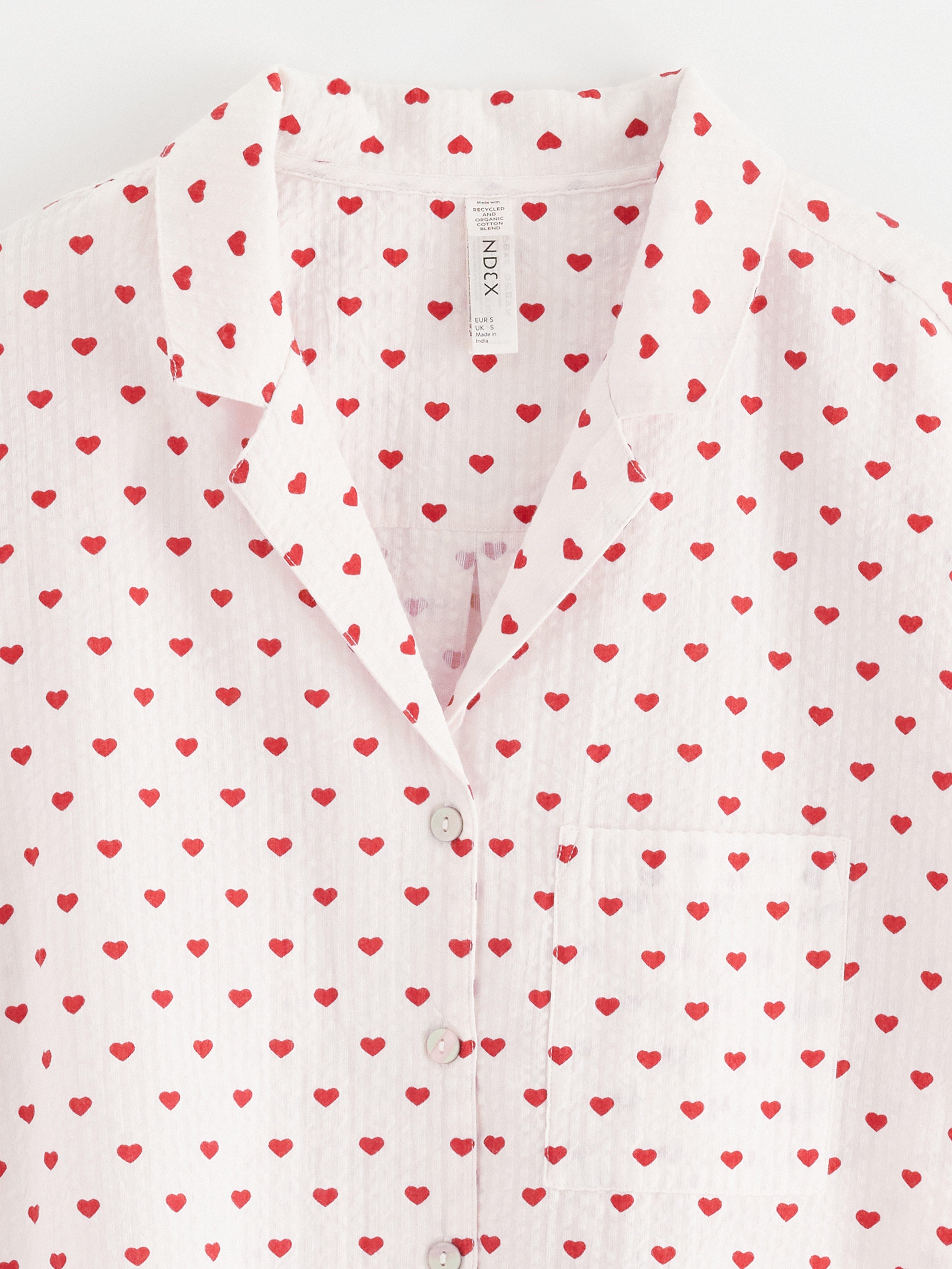 Camisola vermelha com estampa de ondas de riacho