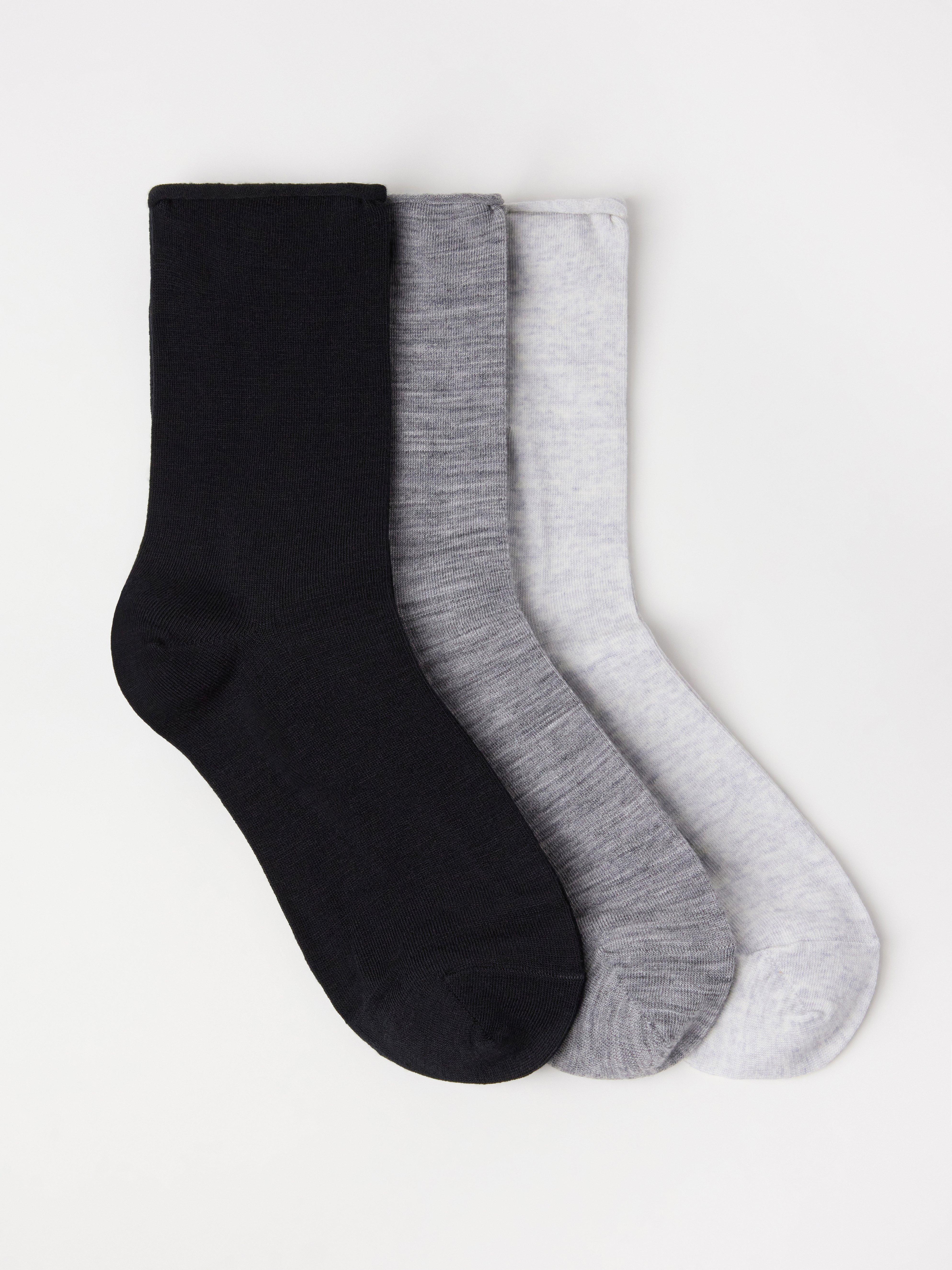 Pacote com 3 pares de meias pretas em mistura de lã merino.
