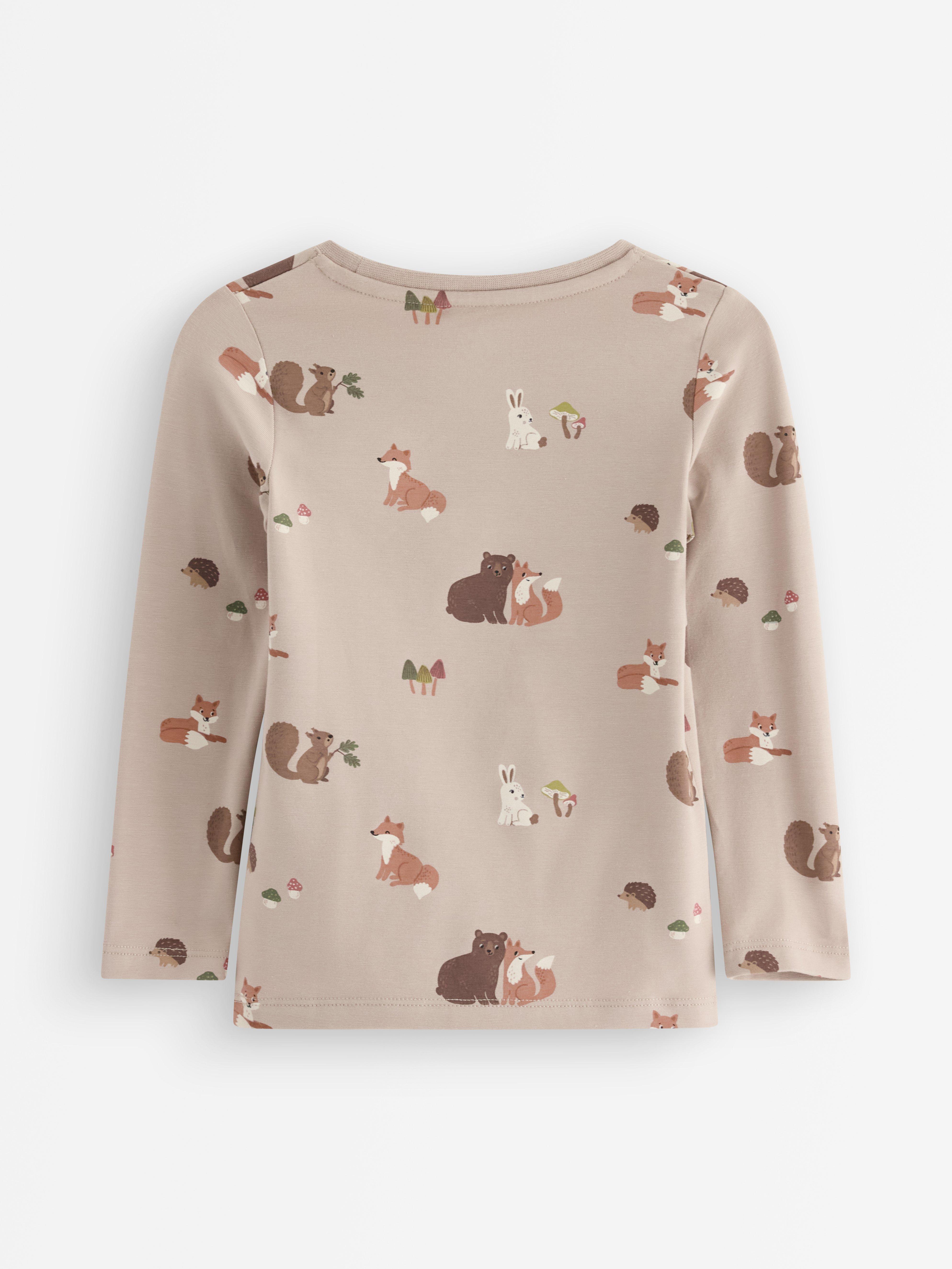 Top de manga larga color beige empolvado