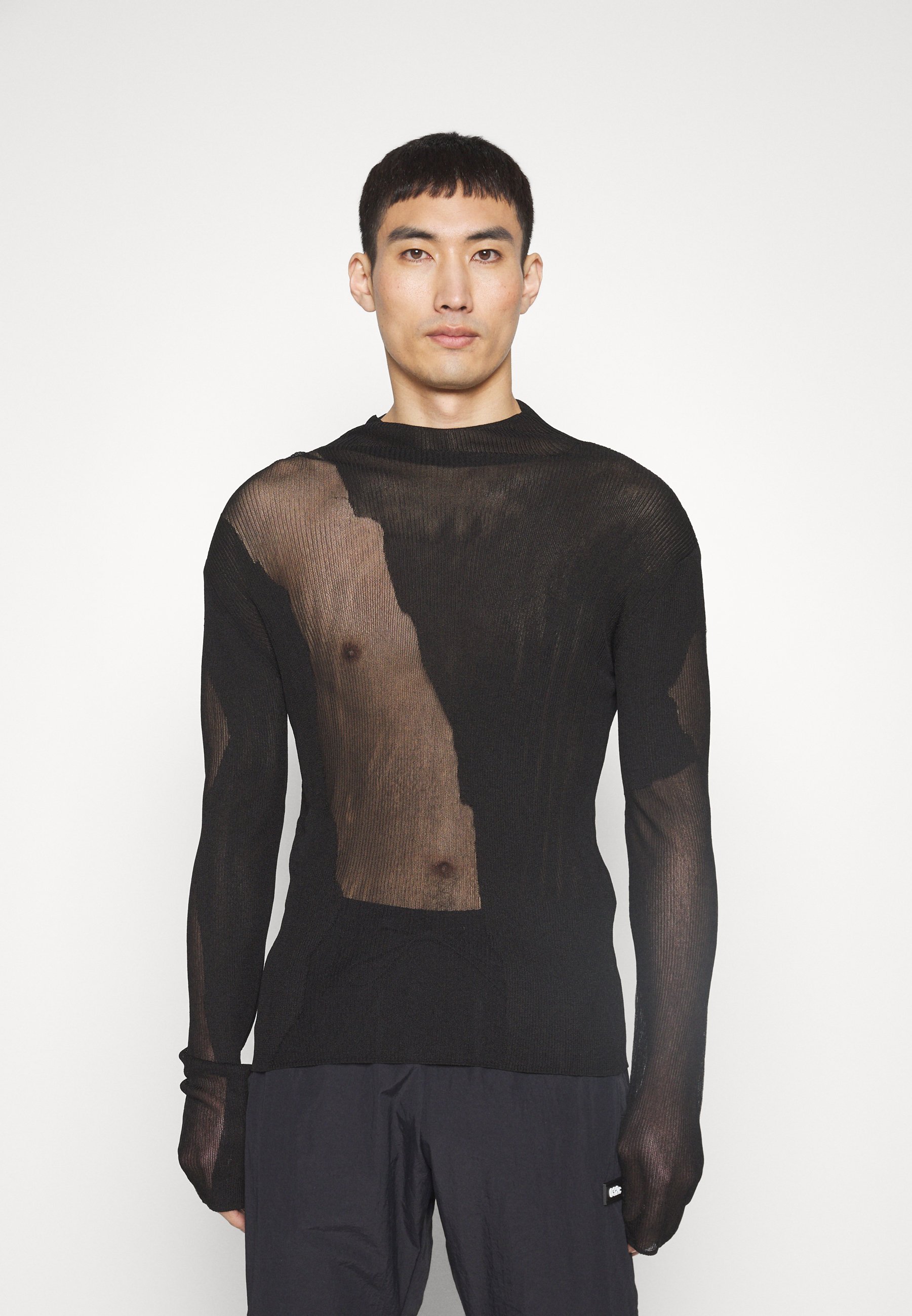 Pull à col roulé transparent 032c - noir