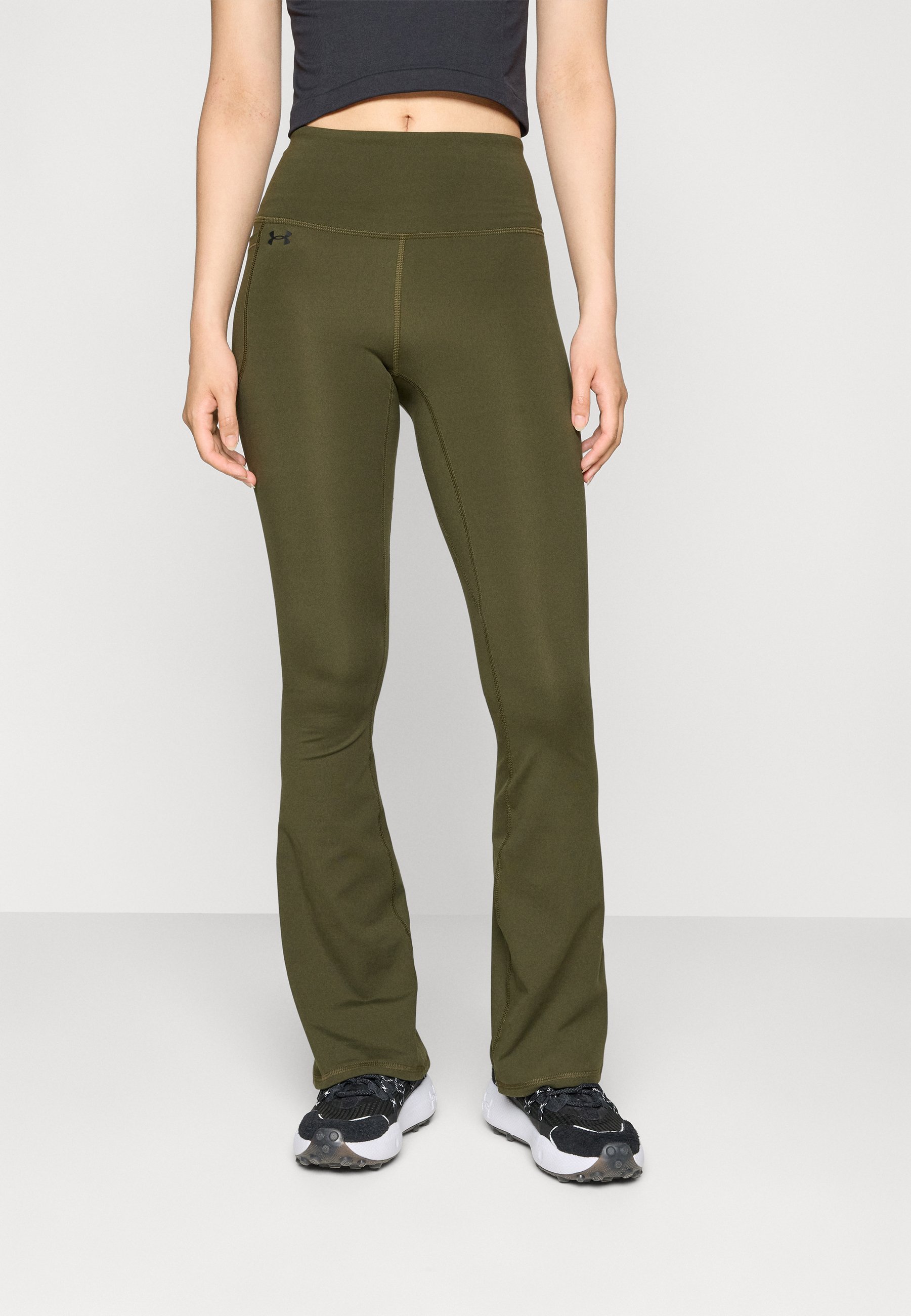 Under Armour MOTION FLARE PANT - Leggings - Expeditionsgrün/Schwarz