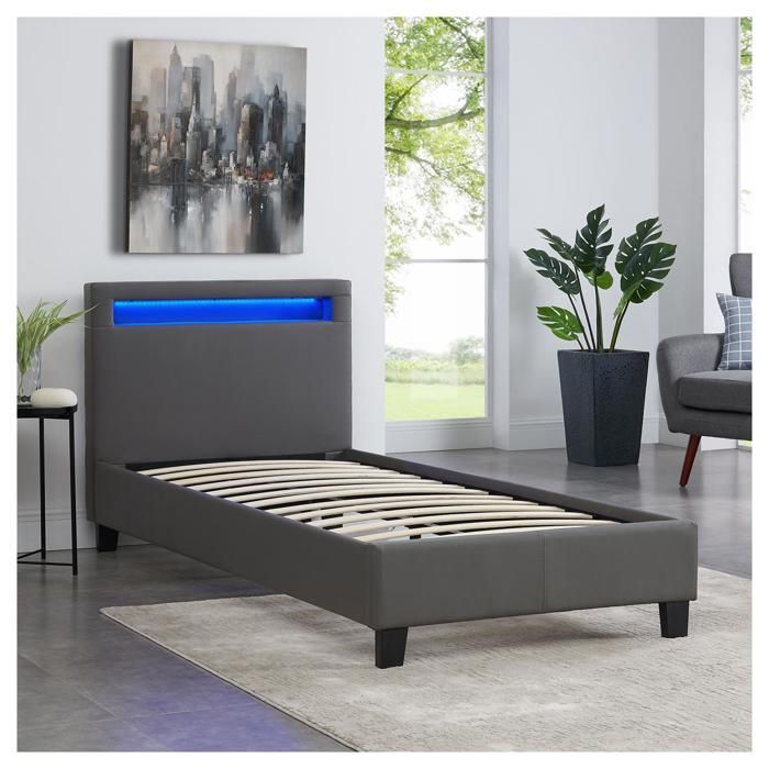Cama de solteiro LUCENO com LED, 90x190 cm, estrado de ripas, cabeceira confortável e estofamento em material sintético cinza.